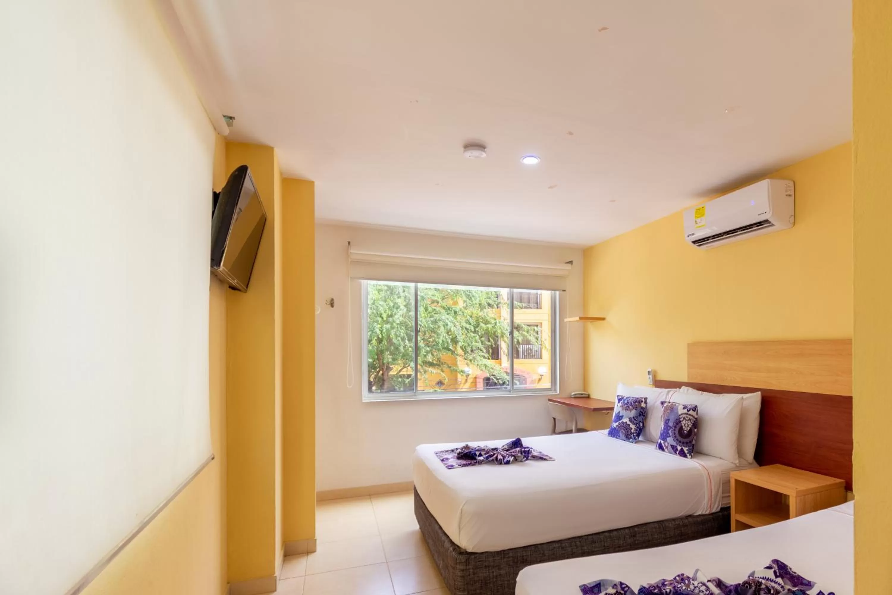 Bed in Hotel Portobahia Santa Marta Rodadero