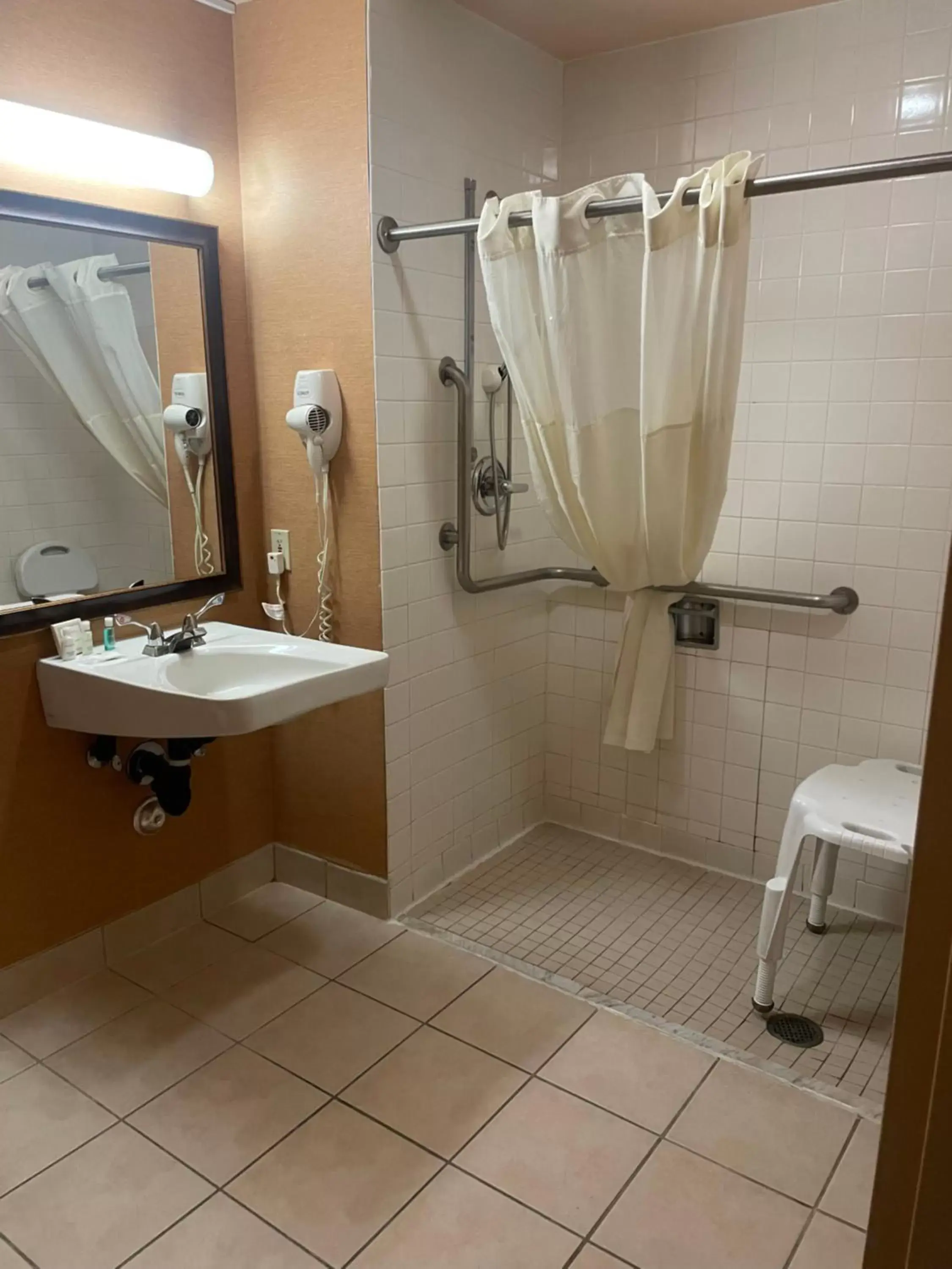 Bathroom in Quality Inn and Conference Center Greeley Downtown