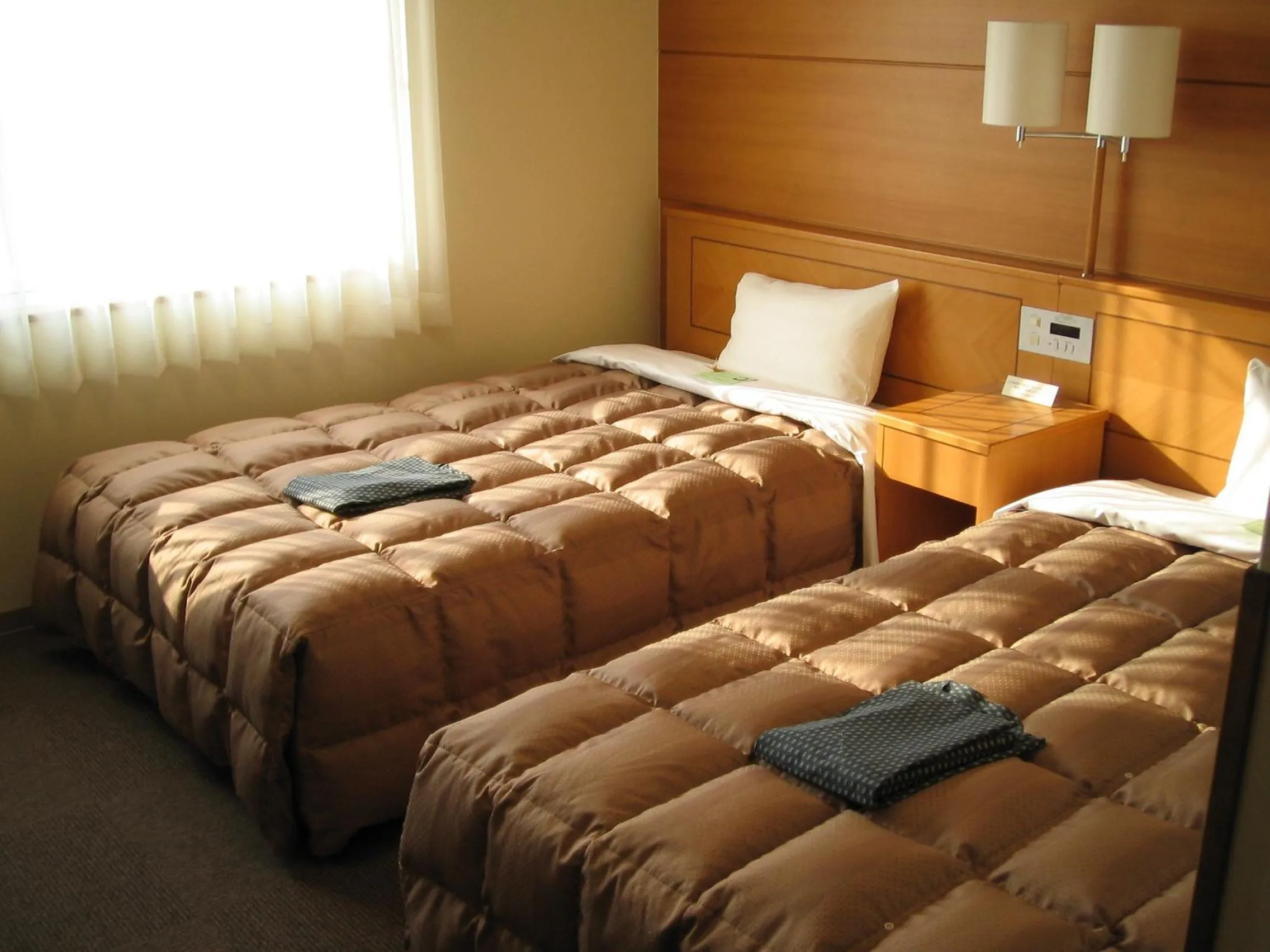 Bed in Hotel Route-Inn Yukuhashi