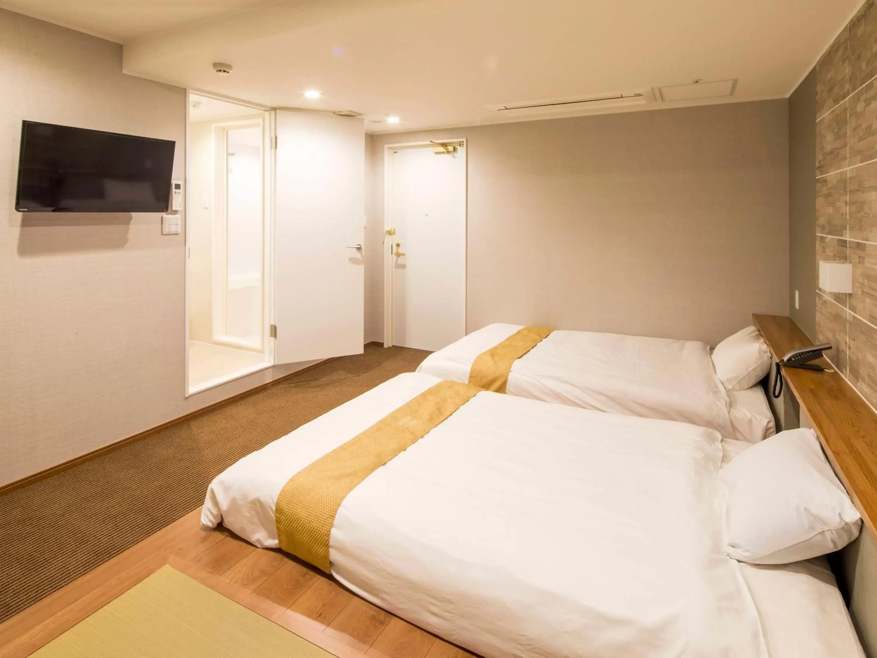 Bed in New Osaka Hotel