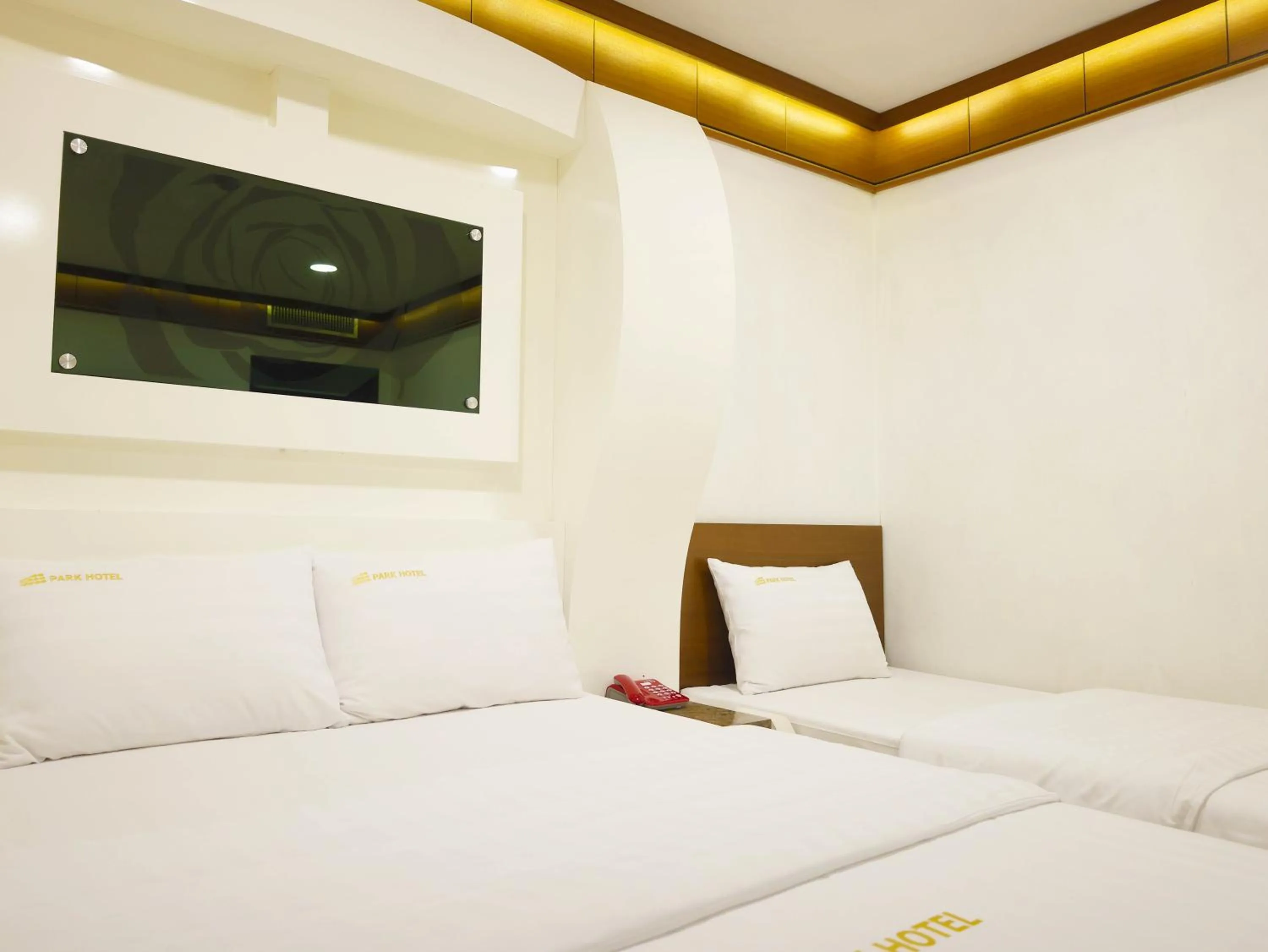 Bed in Goodstay Andong Park Hotel
