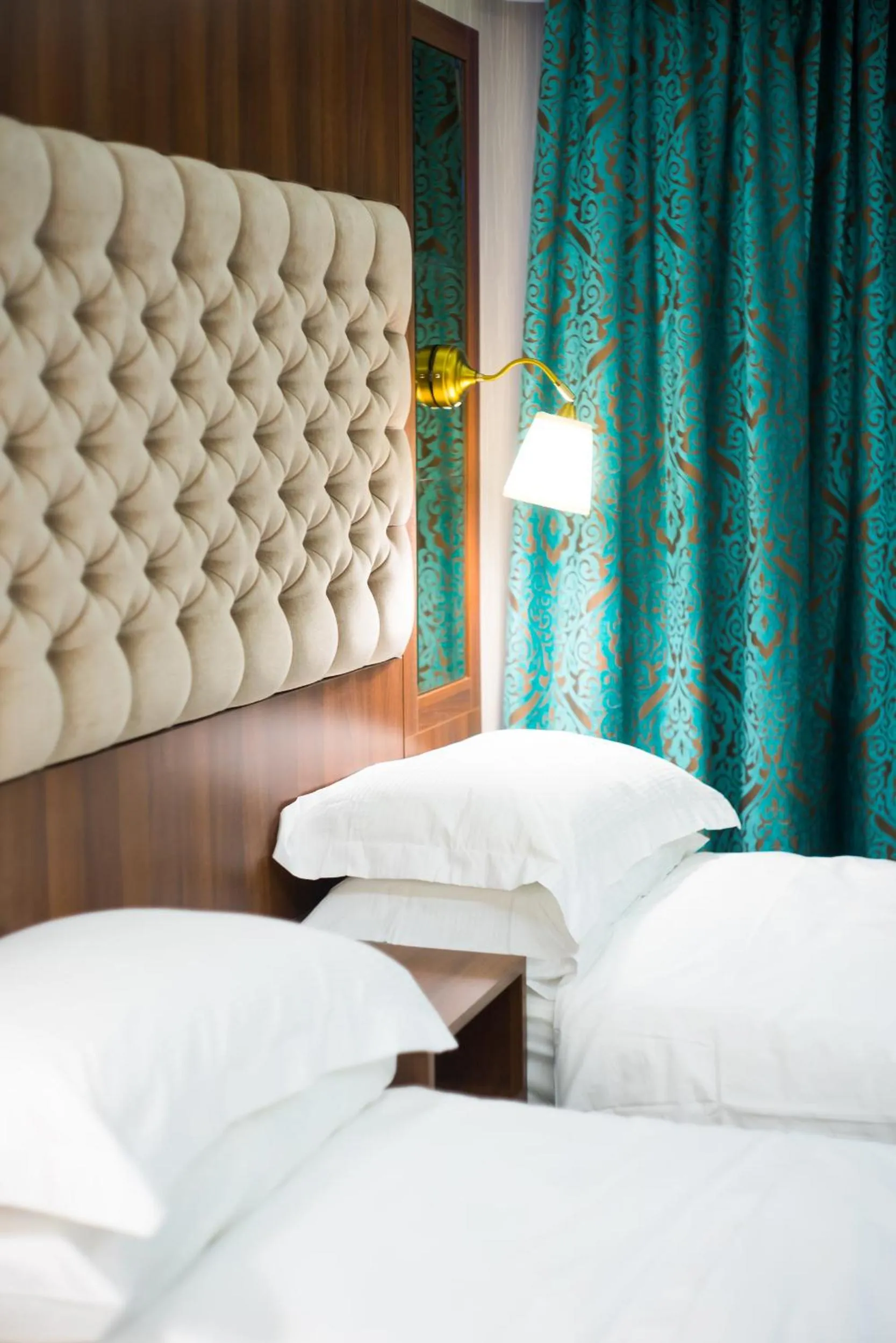 Bed in Kensington Prime Hotel