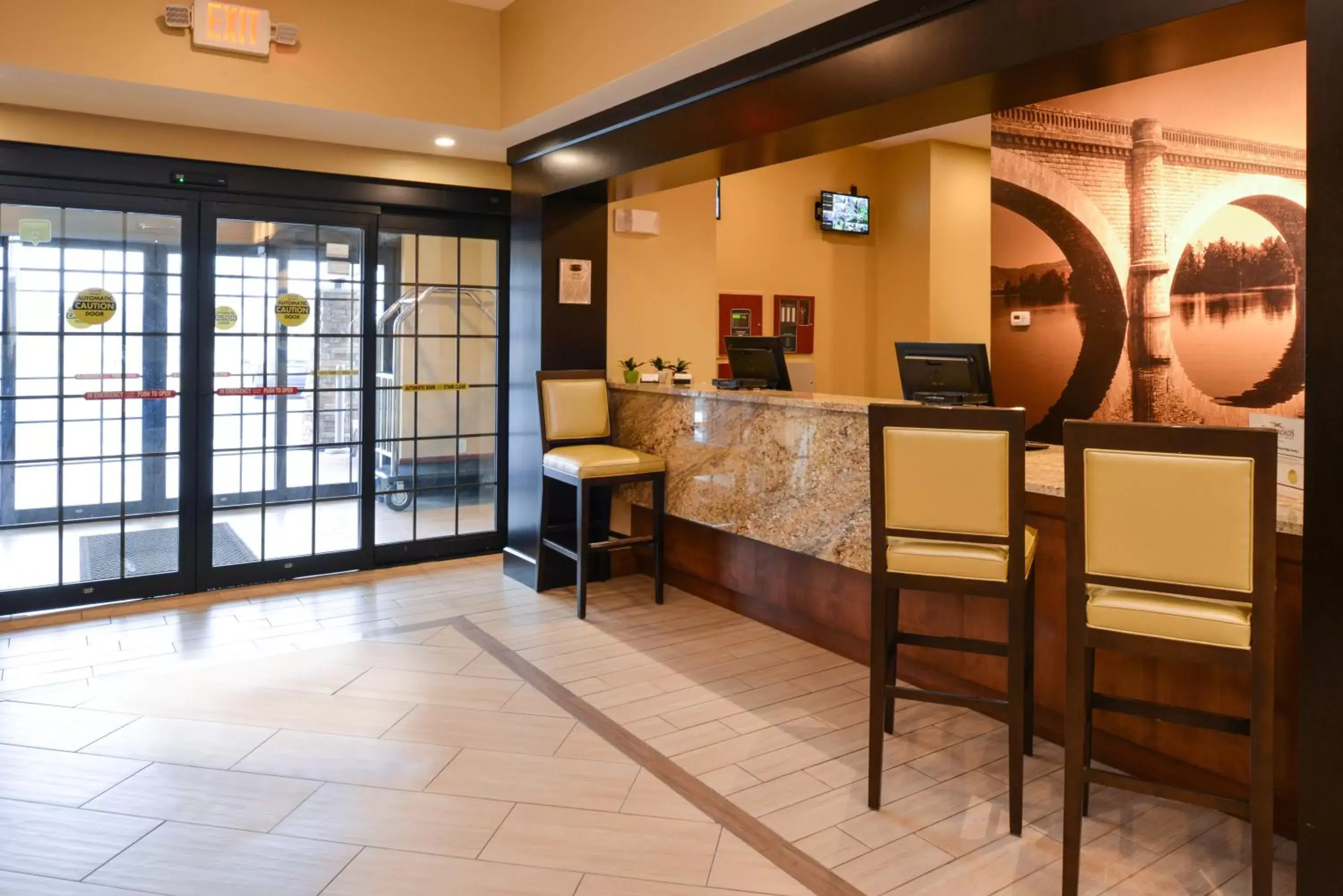 Property building, Lobby/Reception in Staybridge Suites Merrillville, an IHG Hotel