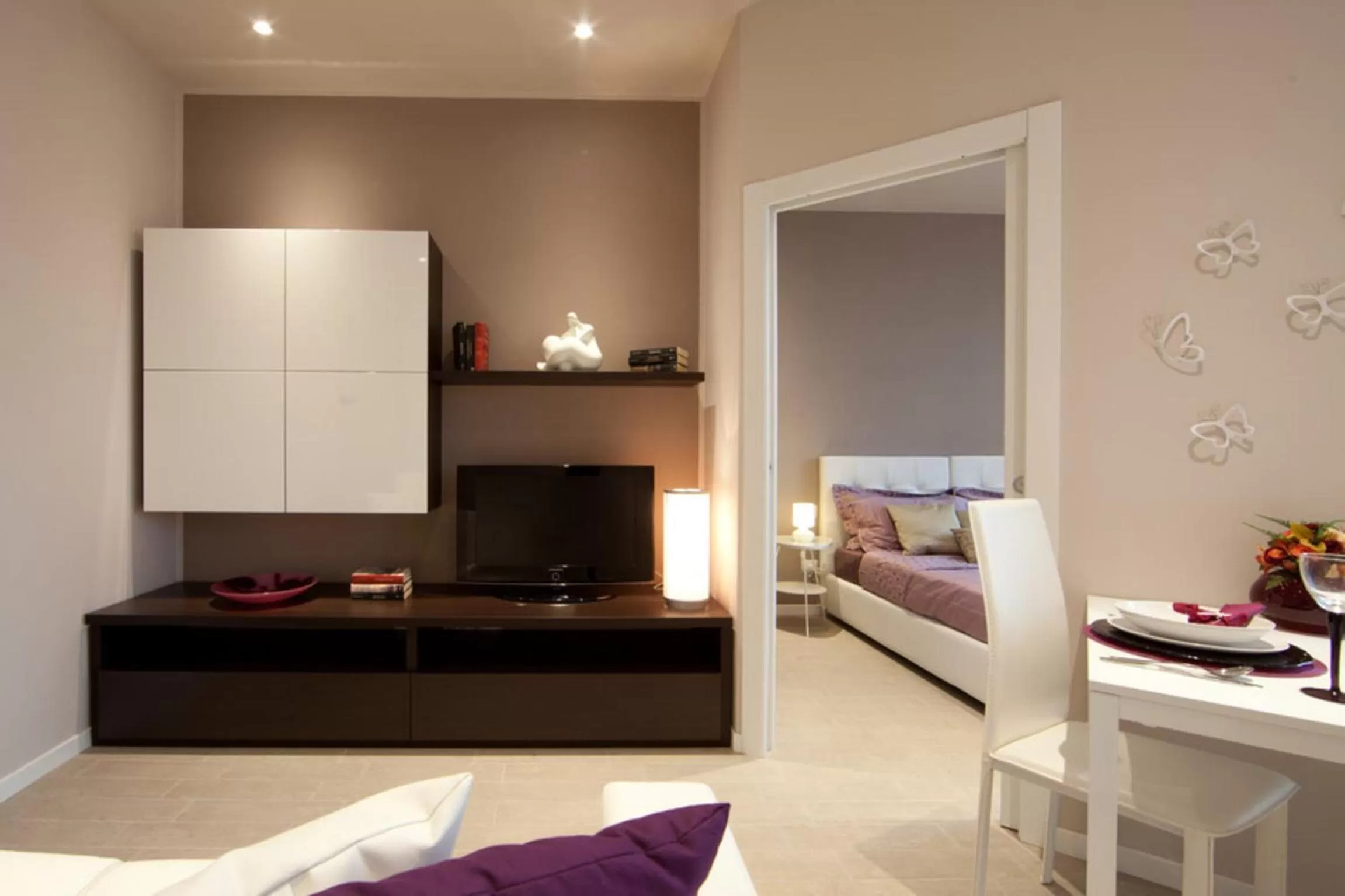 Living room, Bed in La Farina Apartments