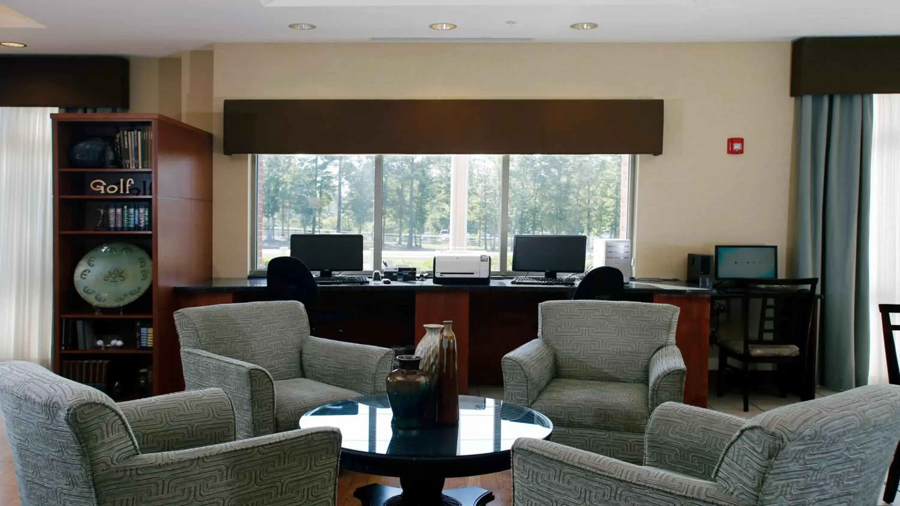 Property building, Seating Area in Holiday Inn Express Leland - Wilmington Area, an IHG Hotel