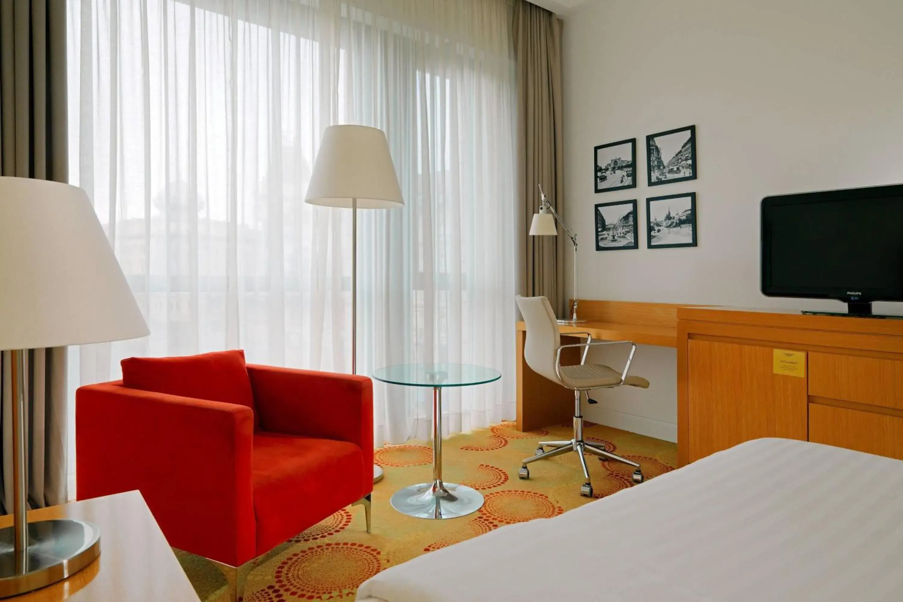 Photo of the whole room, TV/Entertainment Center in Courtyard by Marriott Budapest City Center