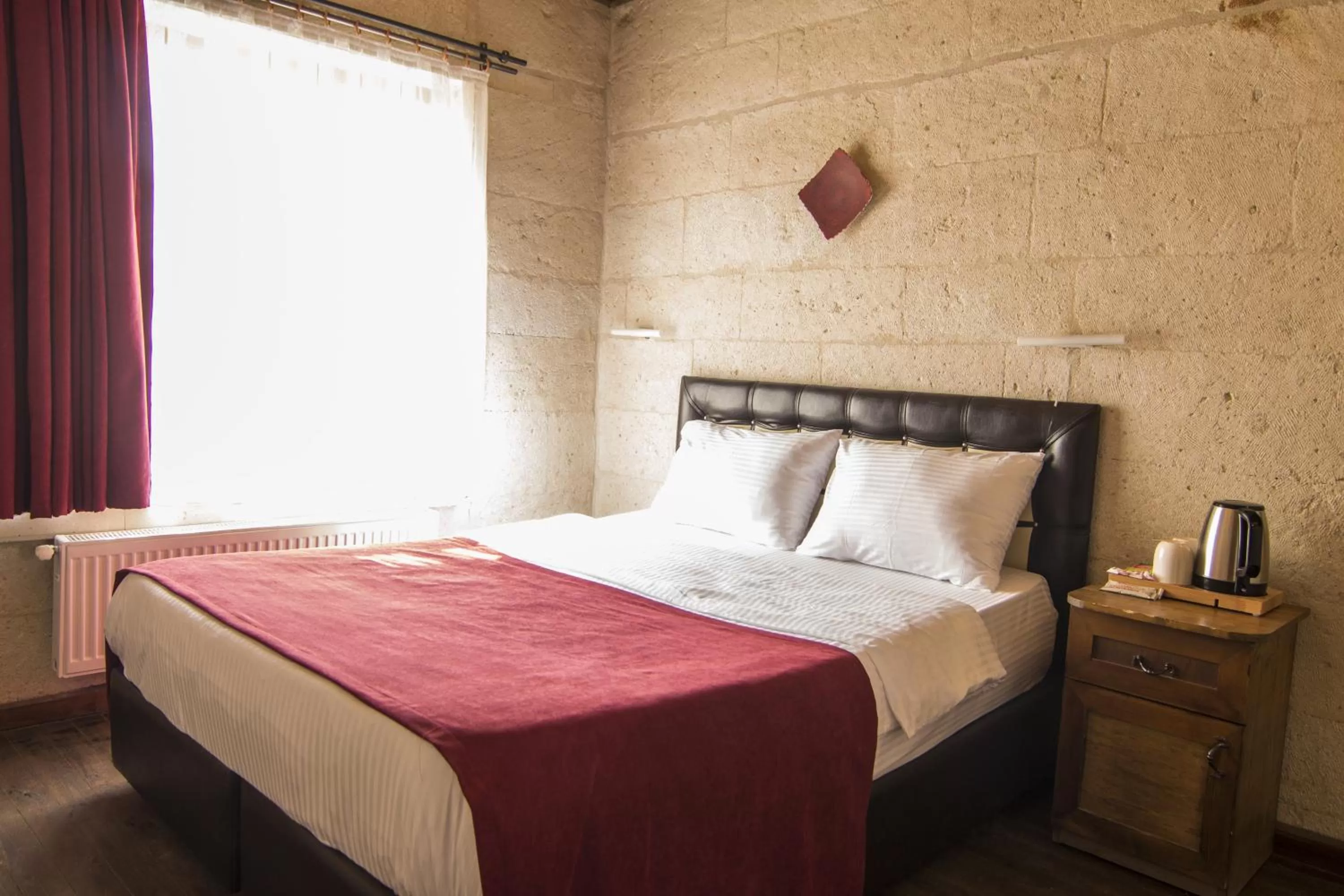 Bed in 7 Oda Kapadokya Cave Hotel