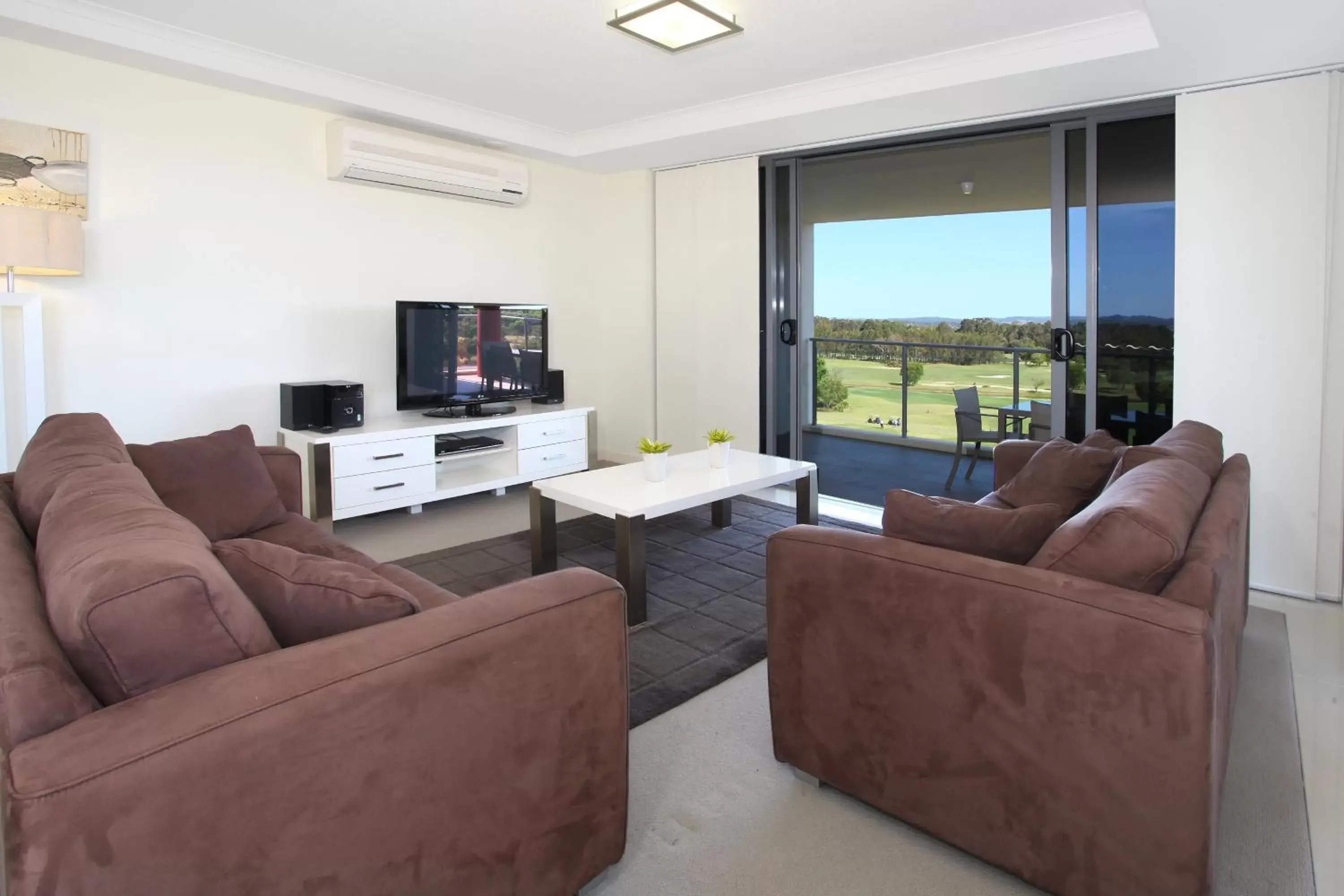 TV and multimedia, Seating Area in Signature Waterfront Apartments