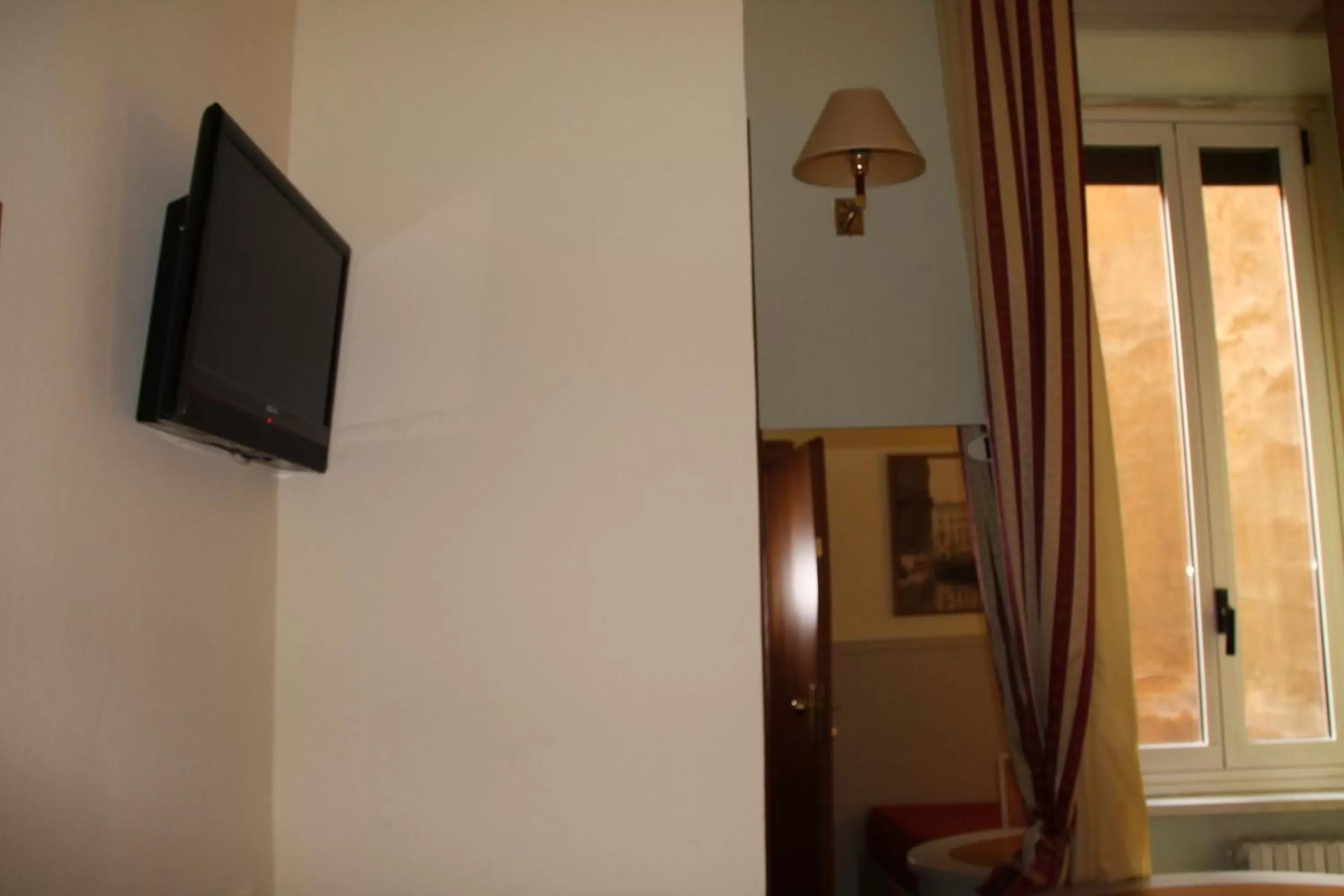 TV and multimedia, TV/Entertainment Center in Hotel Rio