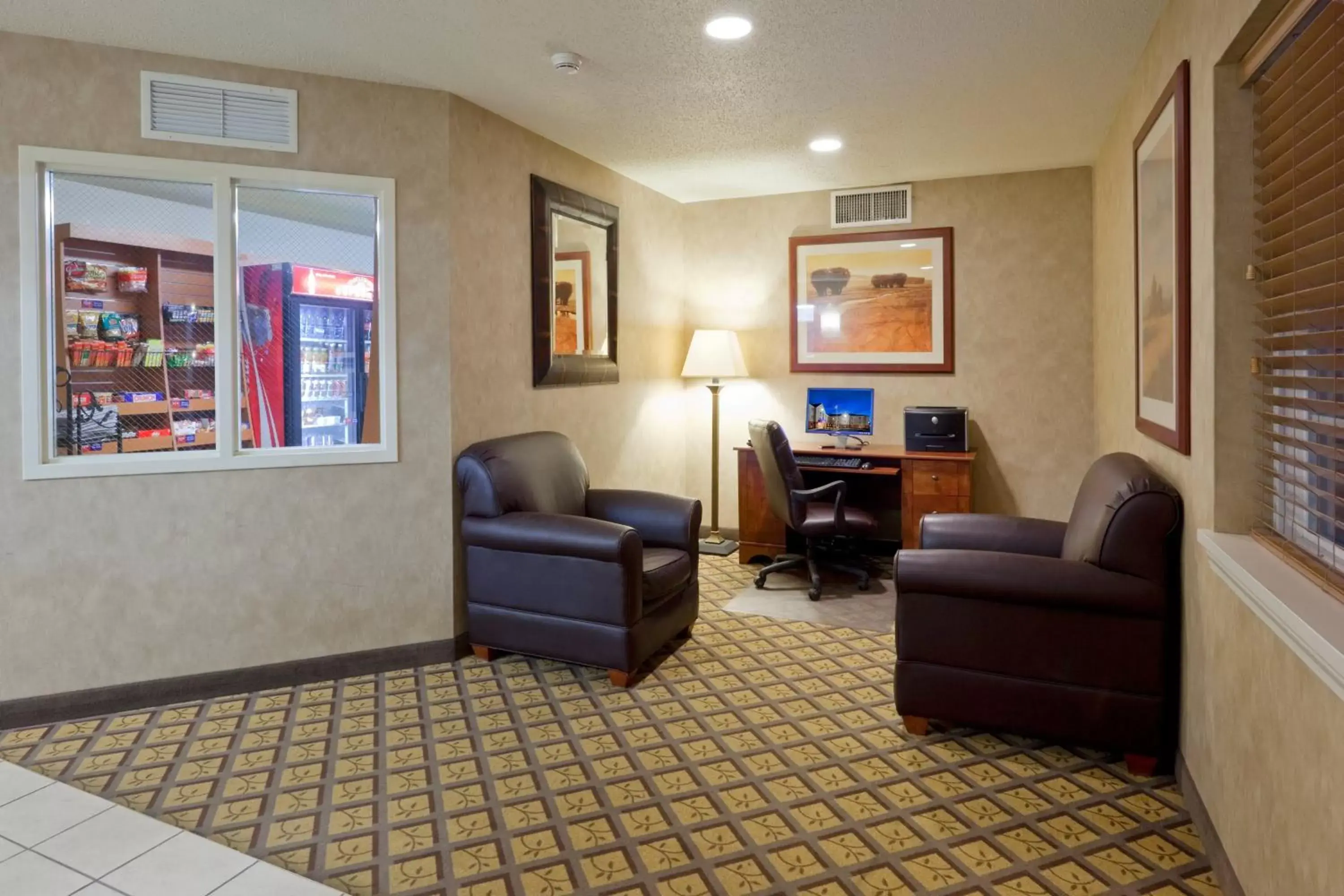 Property building, Seating Area in Candlewood Williamsport, an IHG Hotel