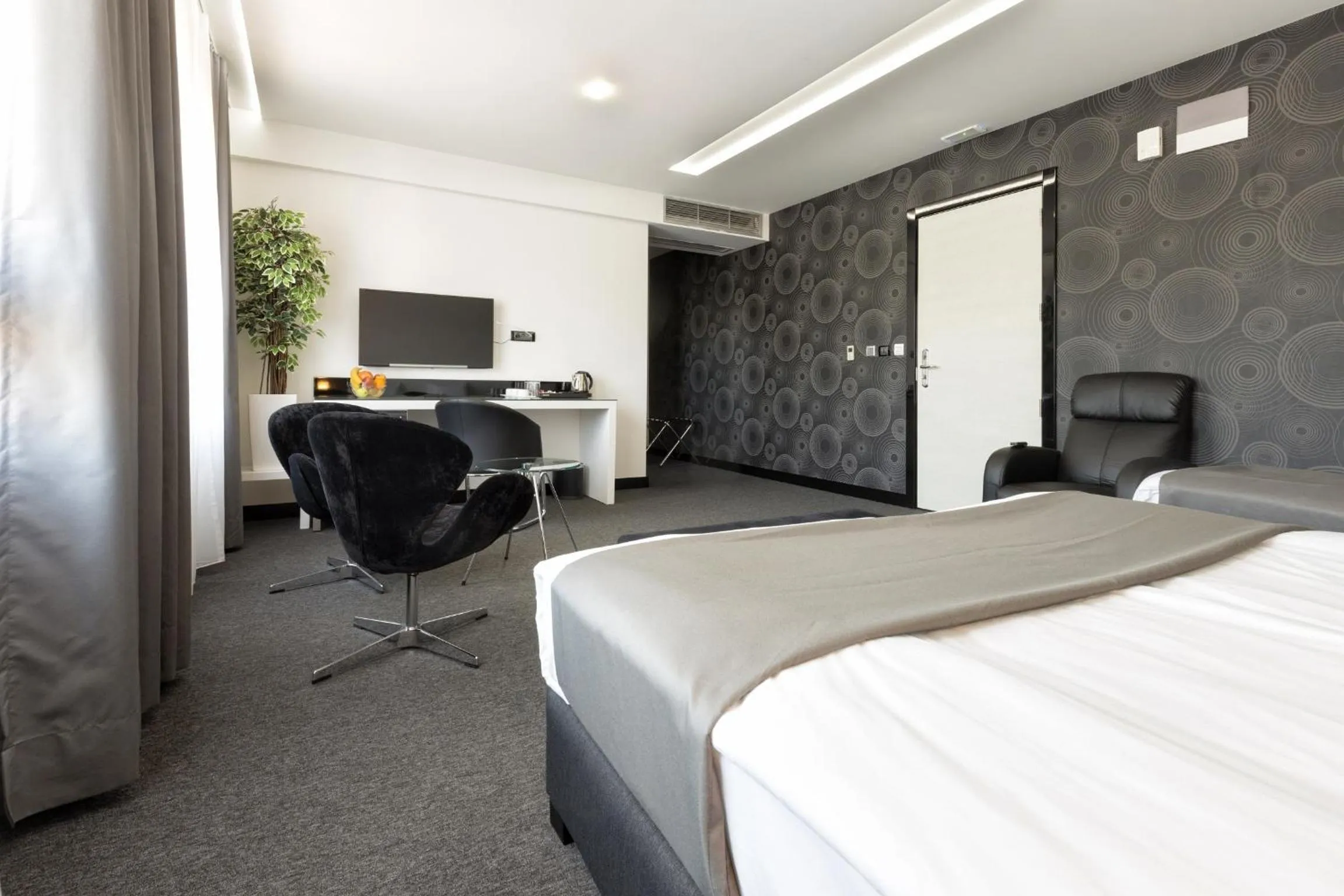 Seating area, Bed in Nova City Garni Hotel Signature Collection