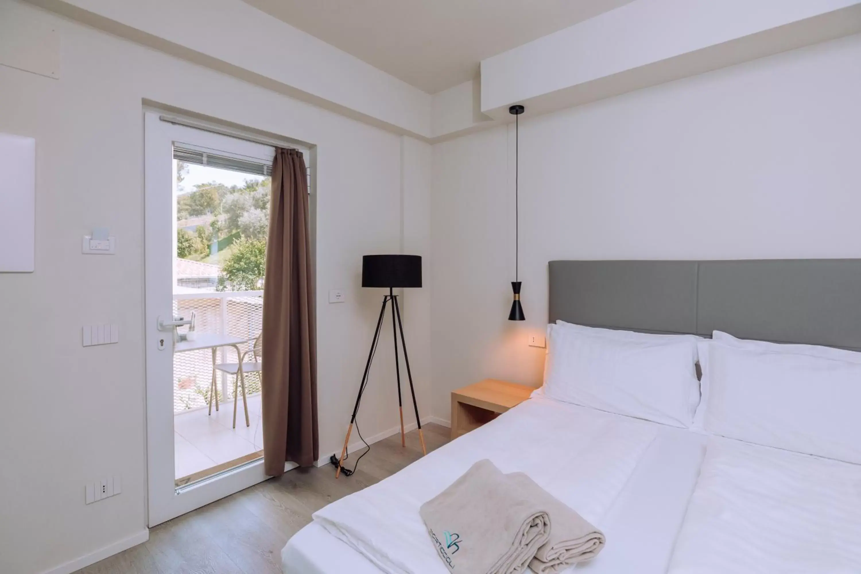 Bed in Ah Porticcioli Boutique Apartments