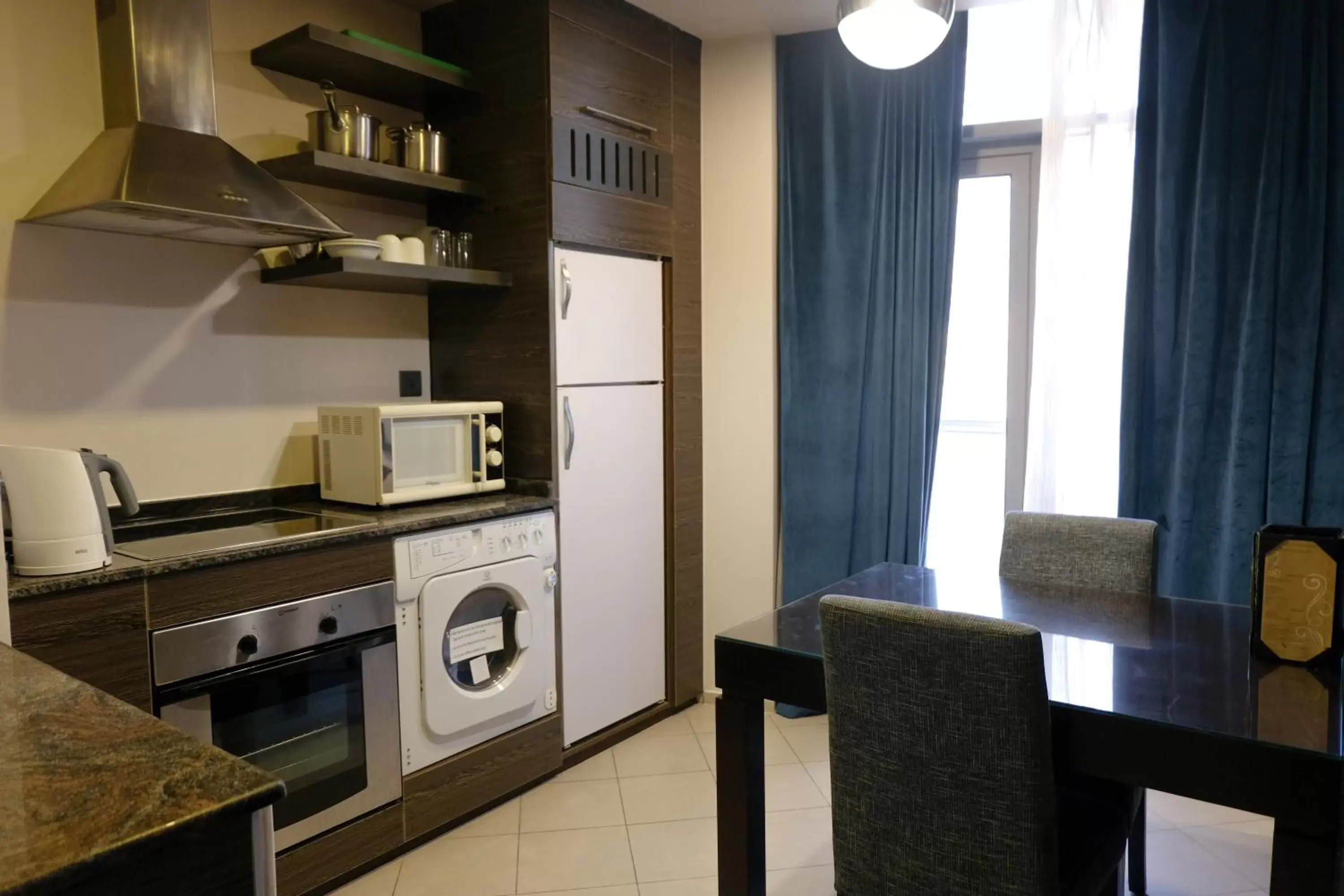 Kitchen or kitchenette, Kitchen/Kitchenette in Signature Hotel Apartments and Spa