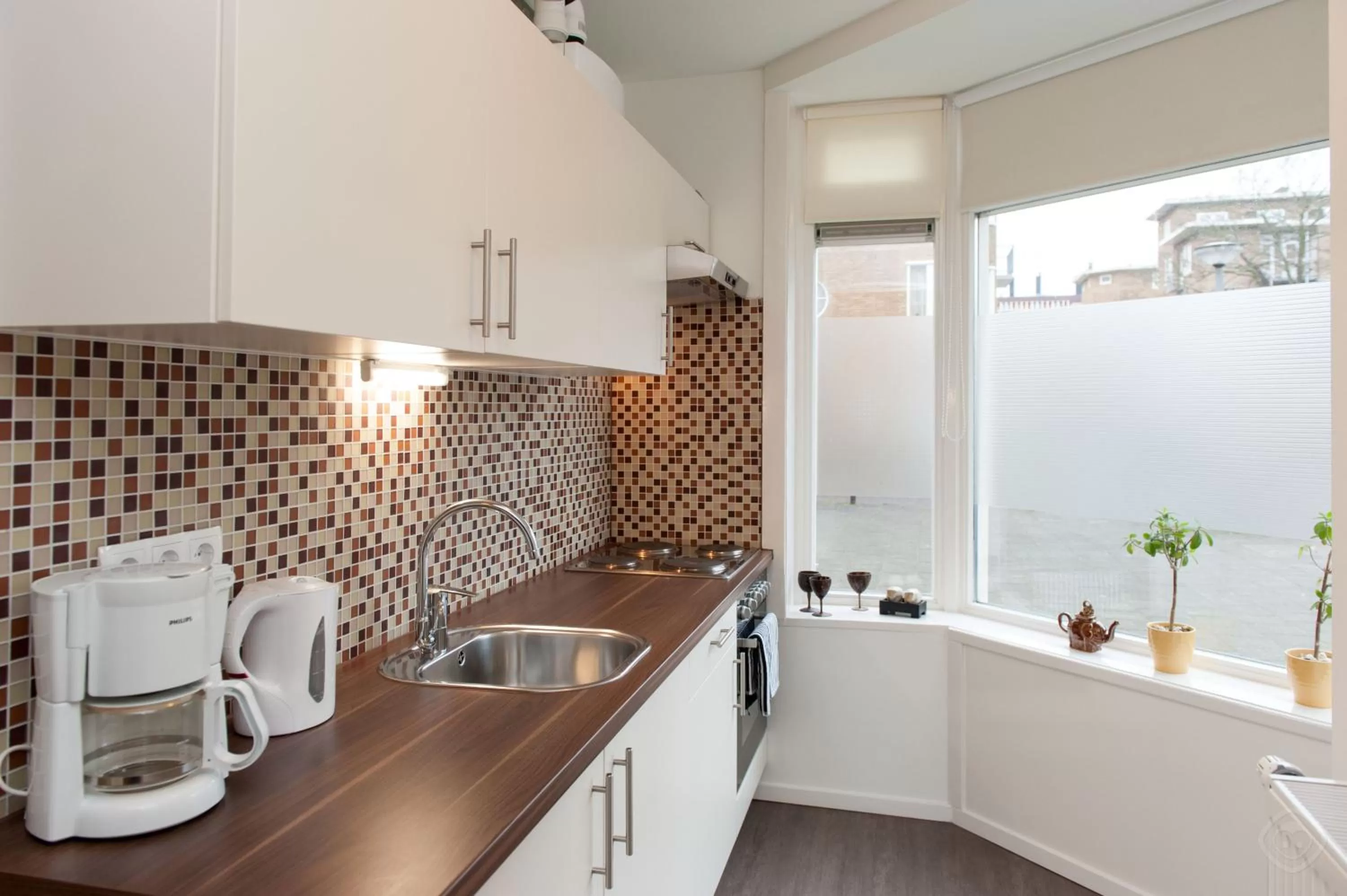 Coffee/tea facilities, Kitchen/Kitchenette in Bos en Lommer Hotel - Erasmus Park area