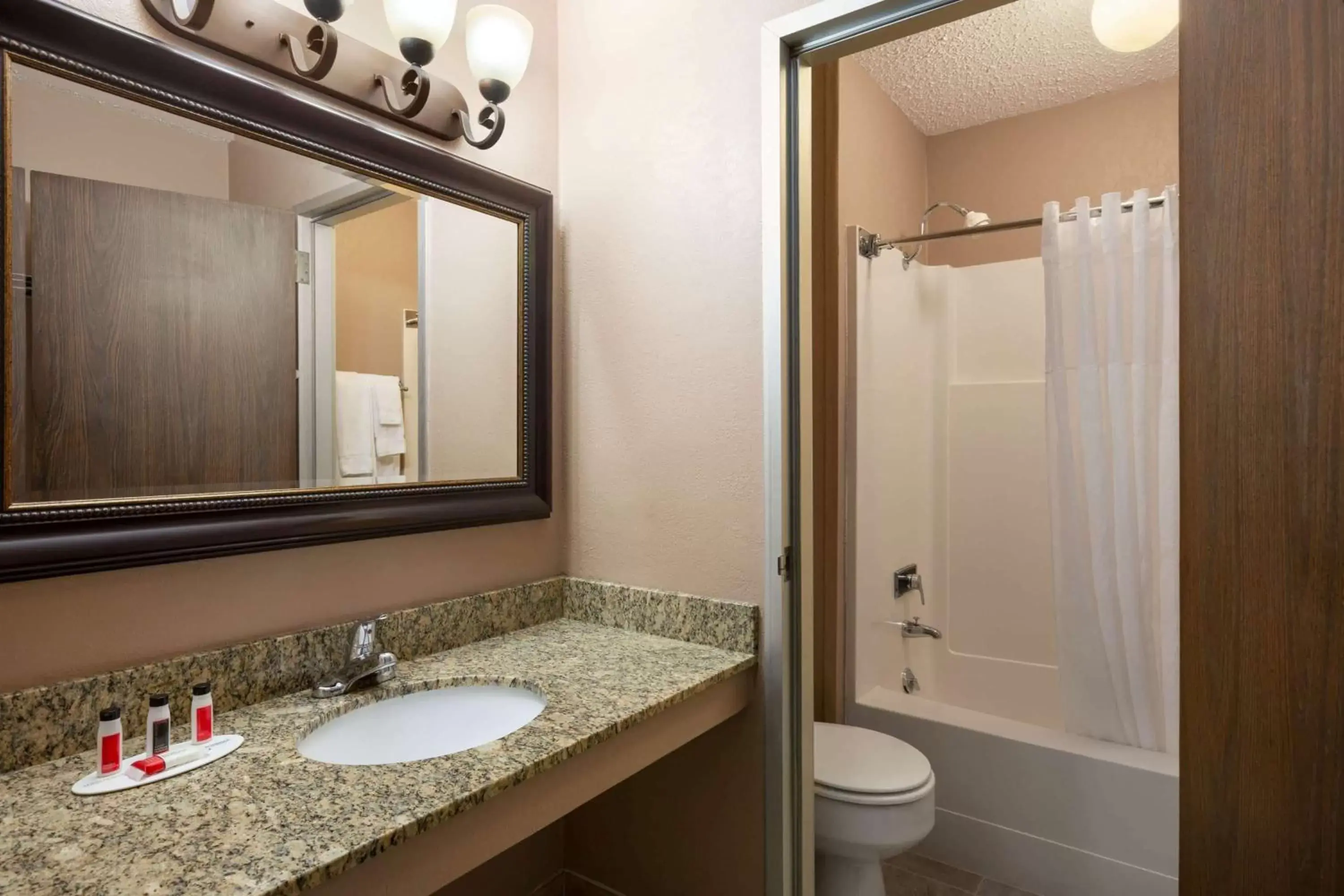 Bathroom in Baymont by Wyndham Mandan Bismarck Area