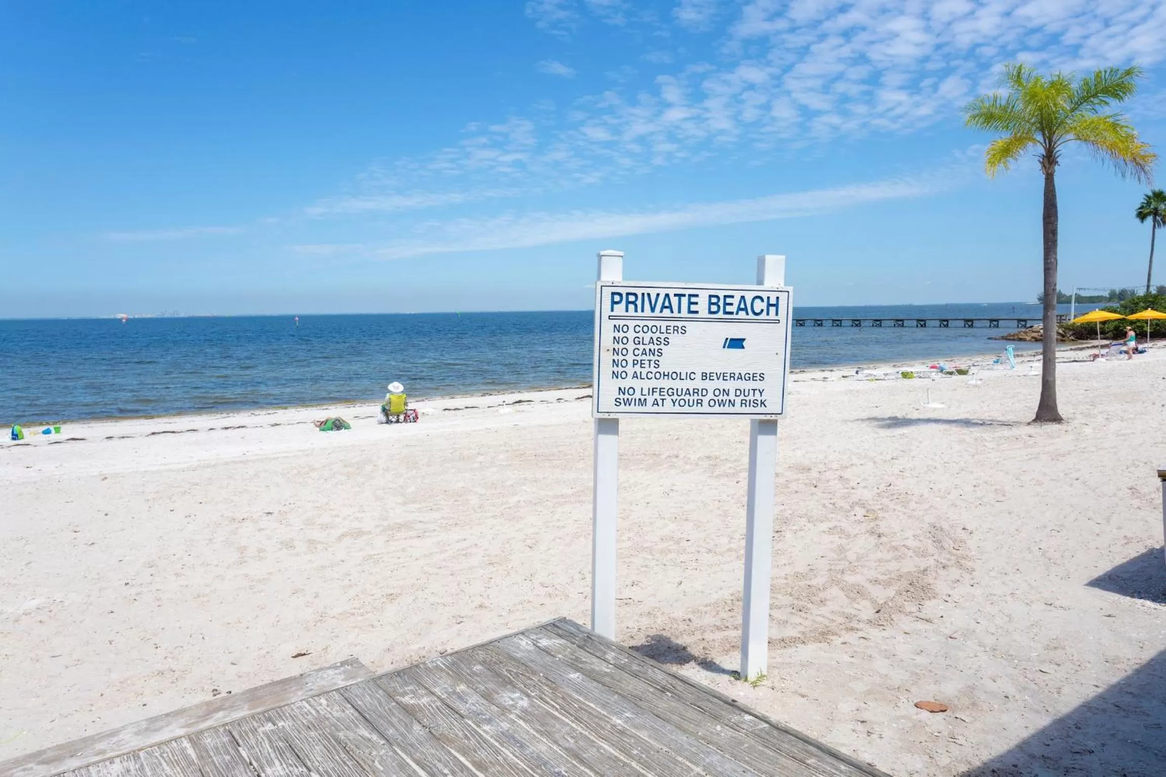 Property logo or sign in TAMPA BAY, BEACH step away, WIFI, FREE PARKING,POOLS, JACUZZI