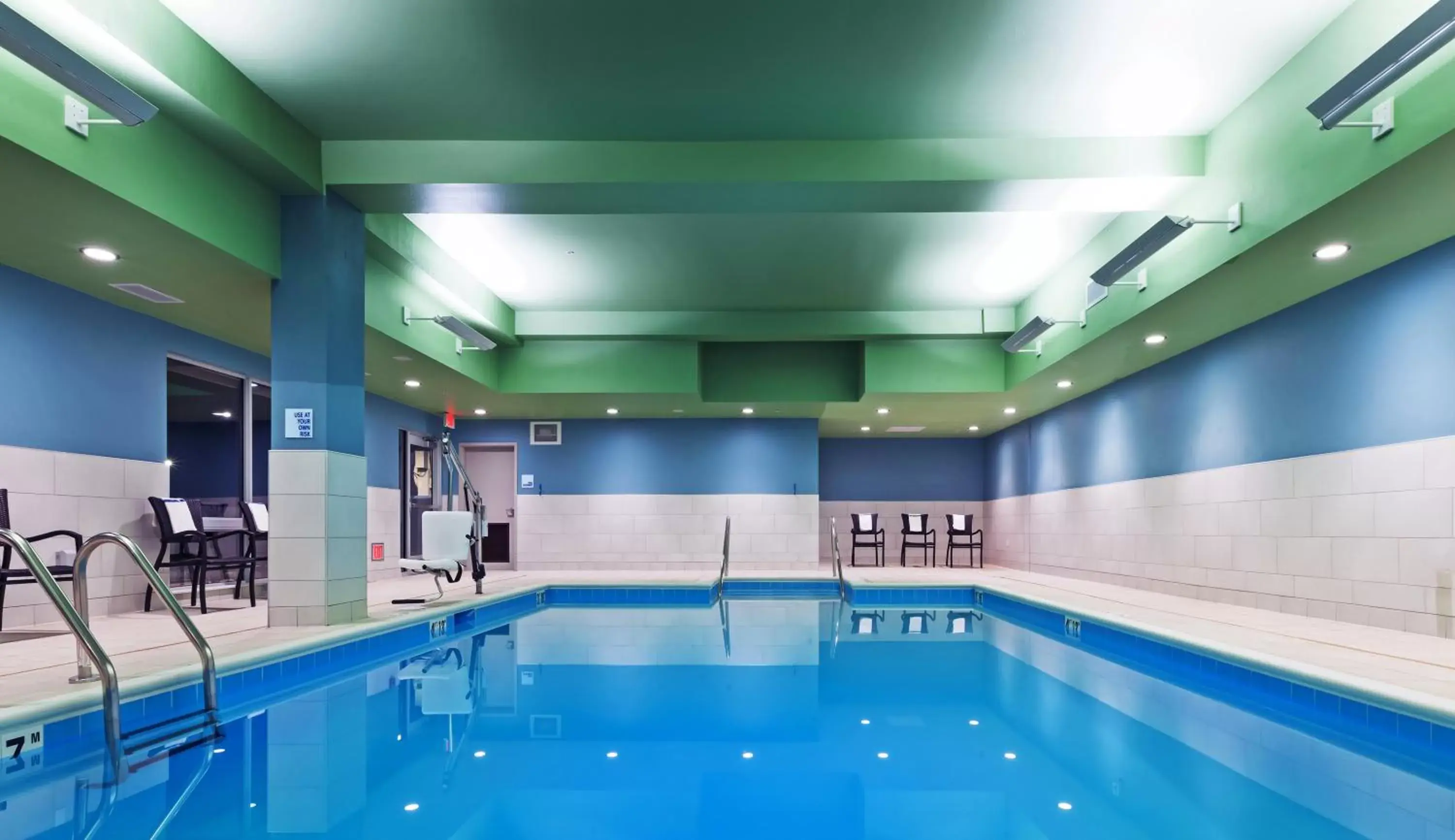 Swimming Pool in Holiday Inn Express and Suites Chanute, an IHG Hotel