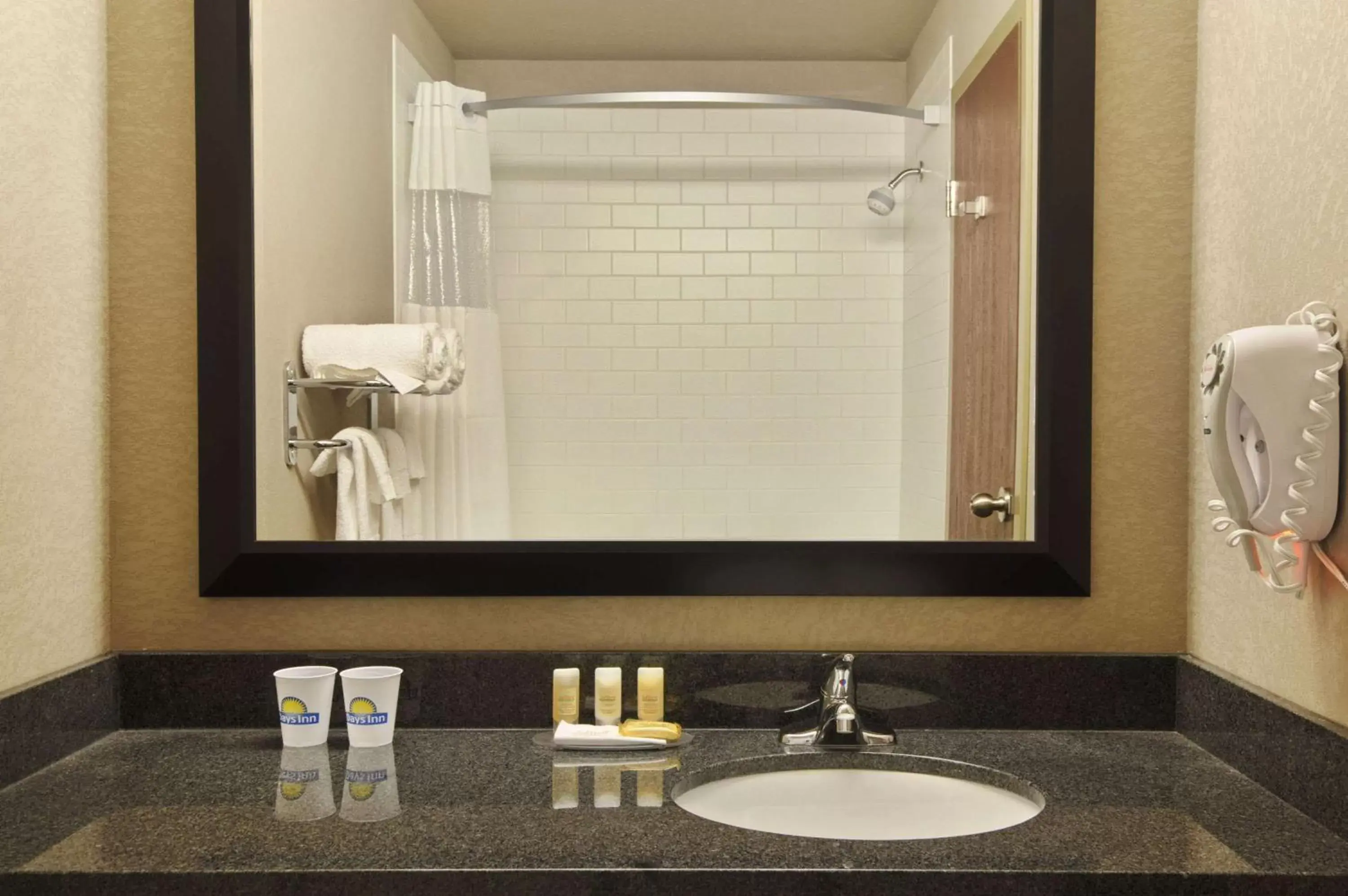 Bathroom in Days Inn by Wyndham Regina Airport West