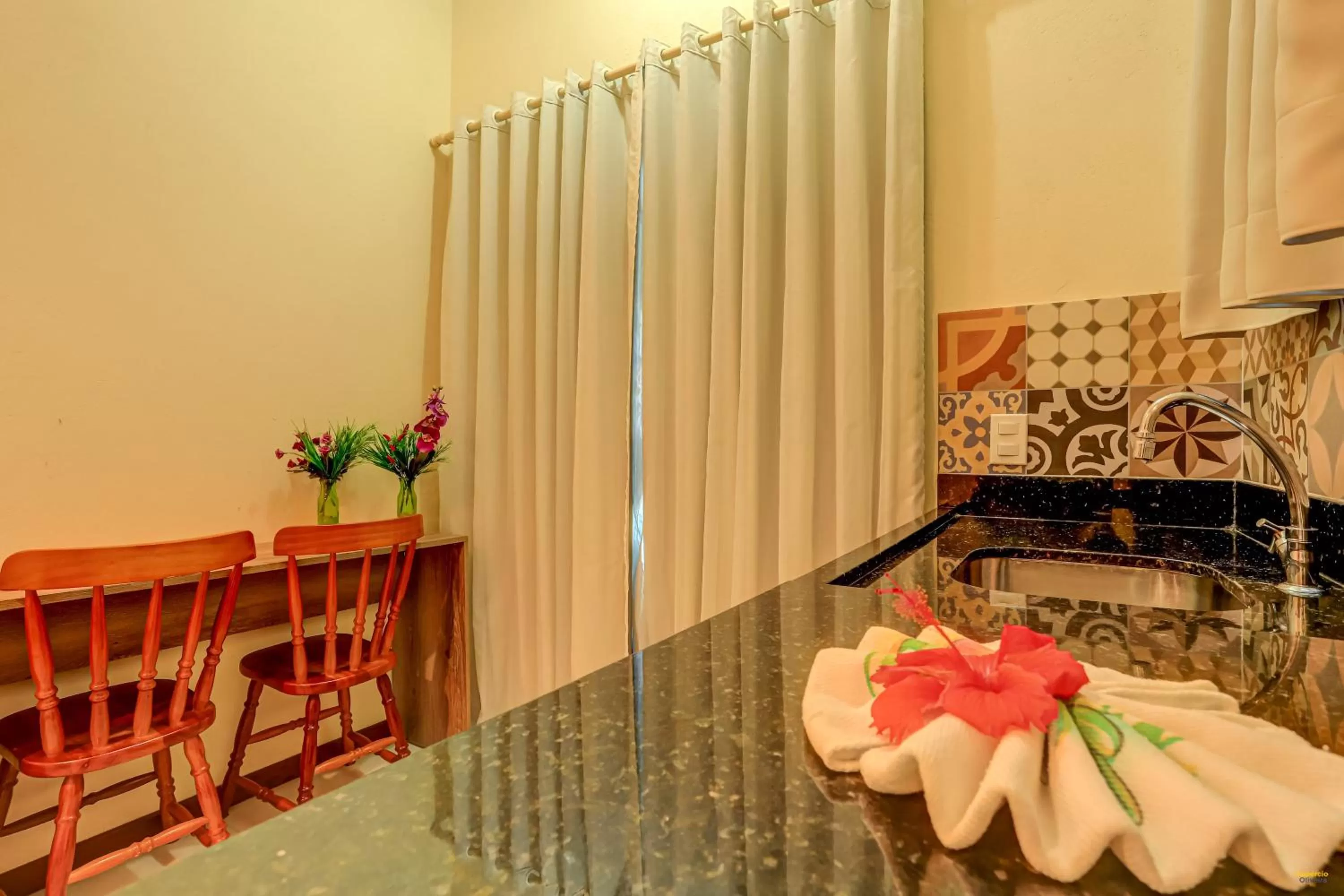 Dining area in i9 Quixaba Flat