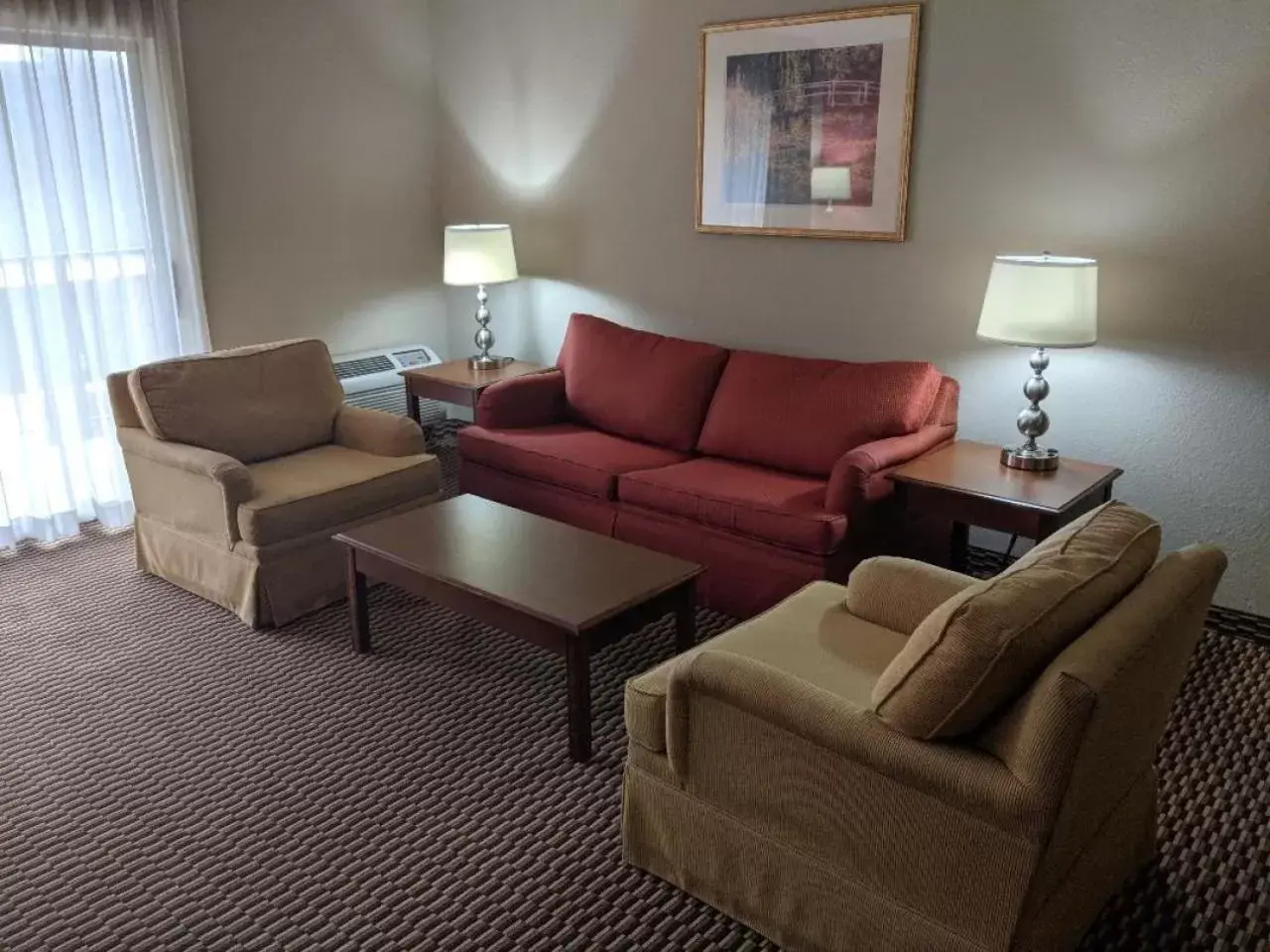 Living room, Seating Area in Ramada by Wyndham Raleigh