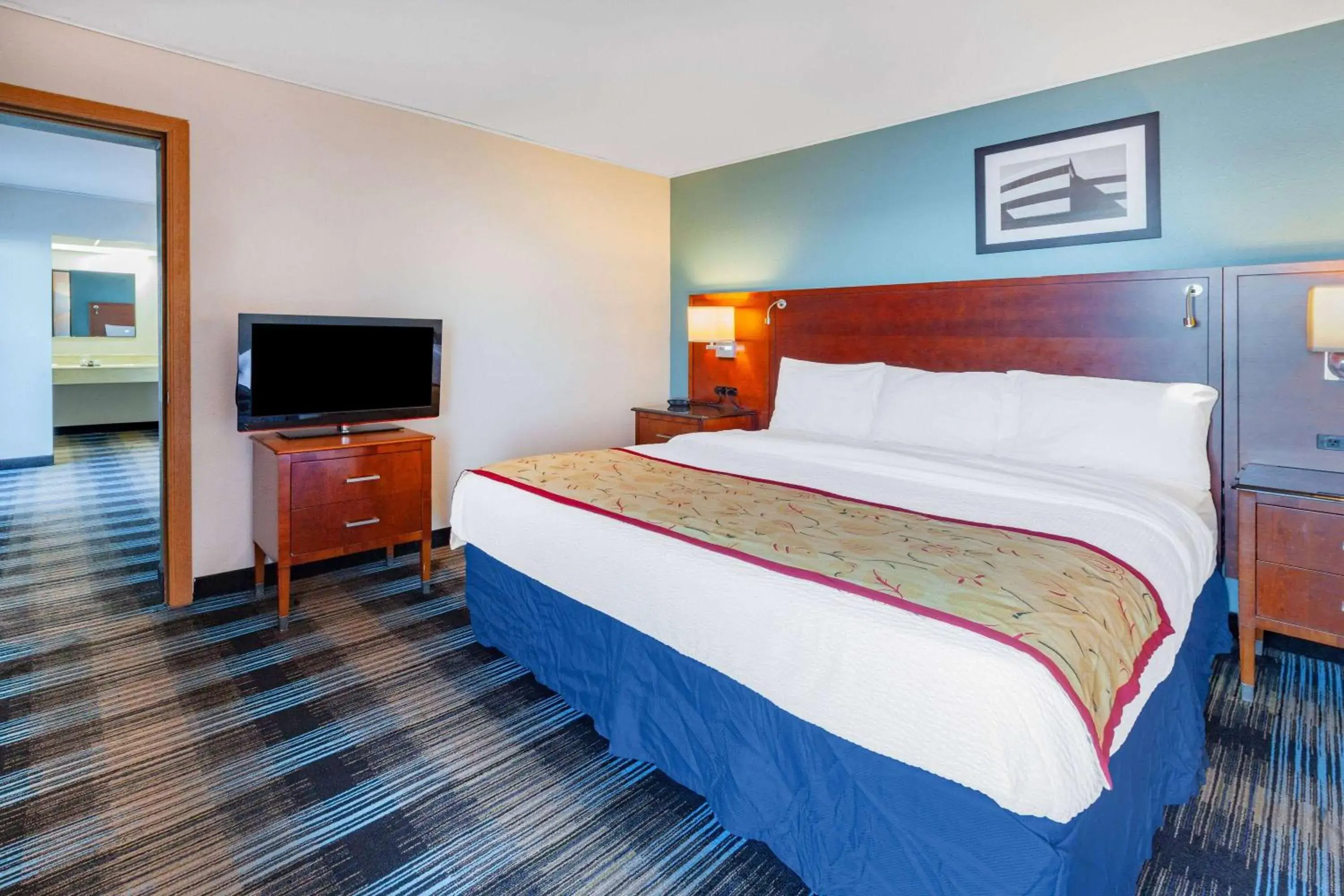 Bed in Days Inn & Suites by Wyndham St. Ignace Lakefront