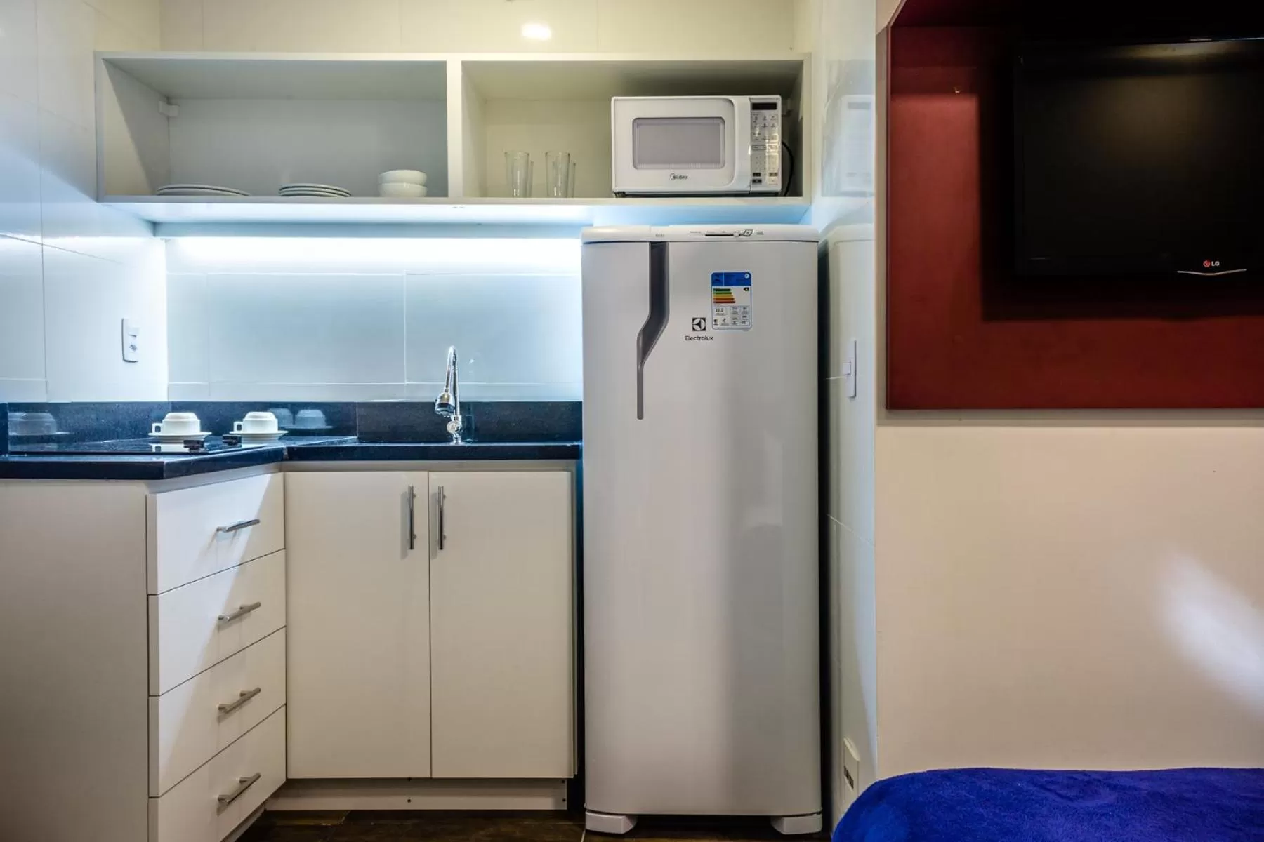 Kitchen or kitchenette in Injoy Suítes & Aparts