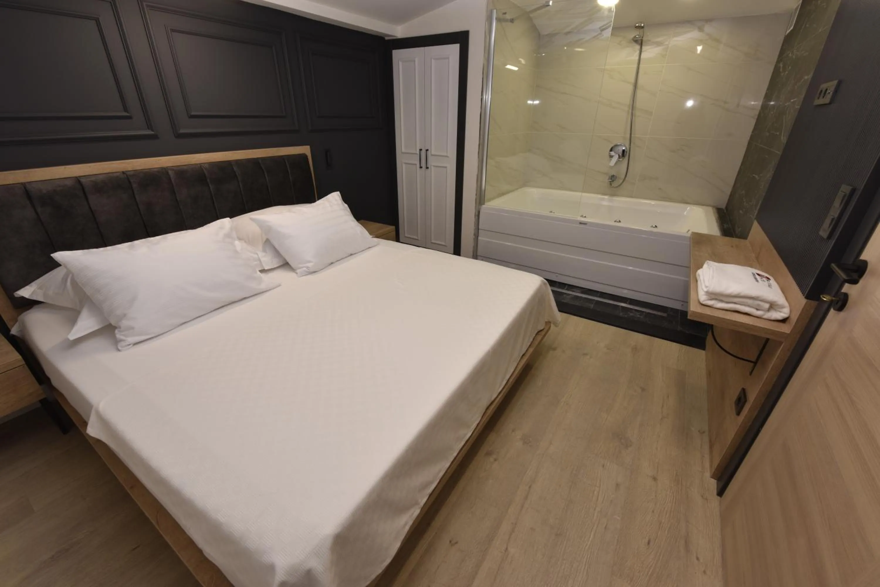 Bed in RW BOUTIQUE HOTEL