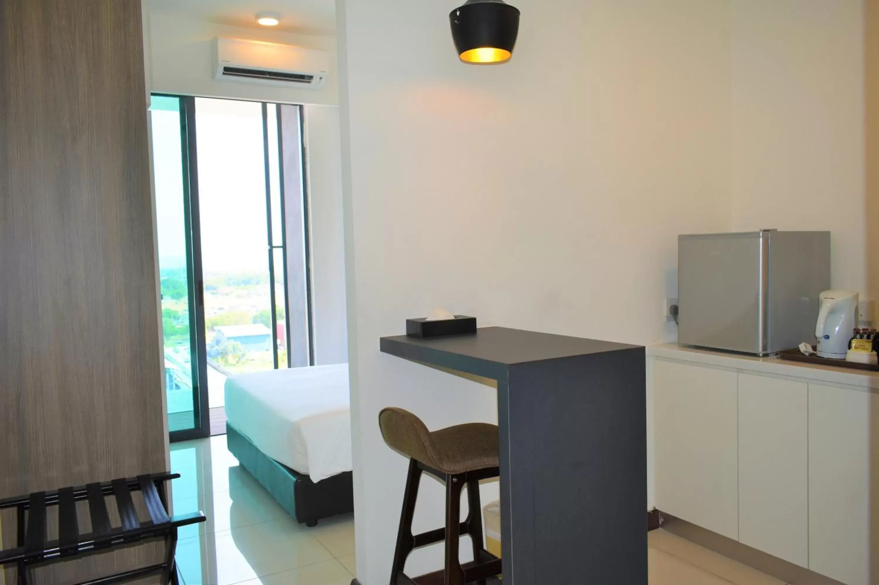 Kitchen/Kitchenette in D'Wharf Hotel & Serviced Residence