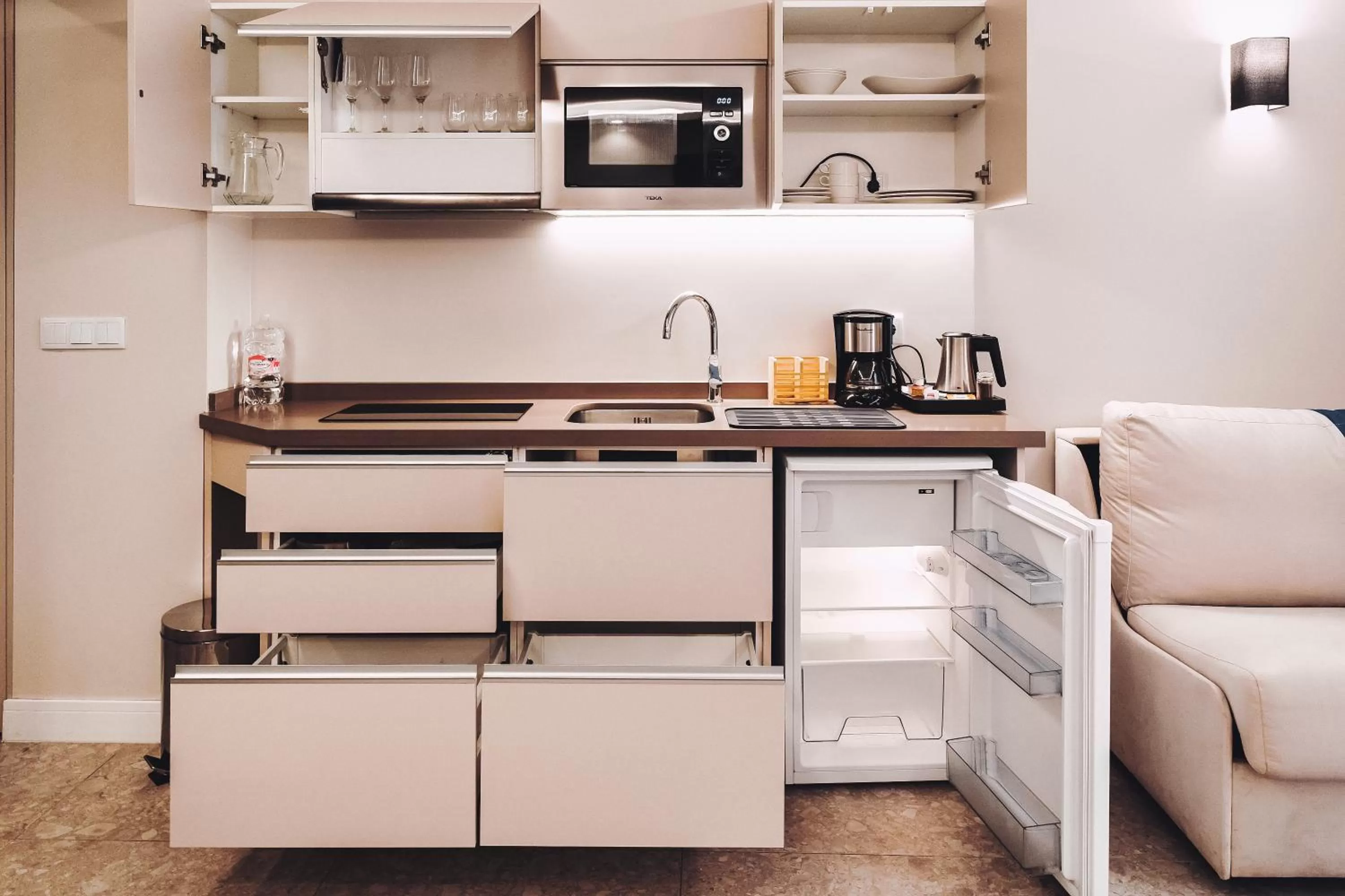 Kitchen or kitchenette in Posidonia Aparthotel