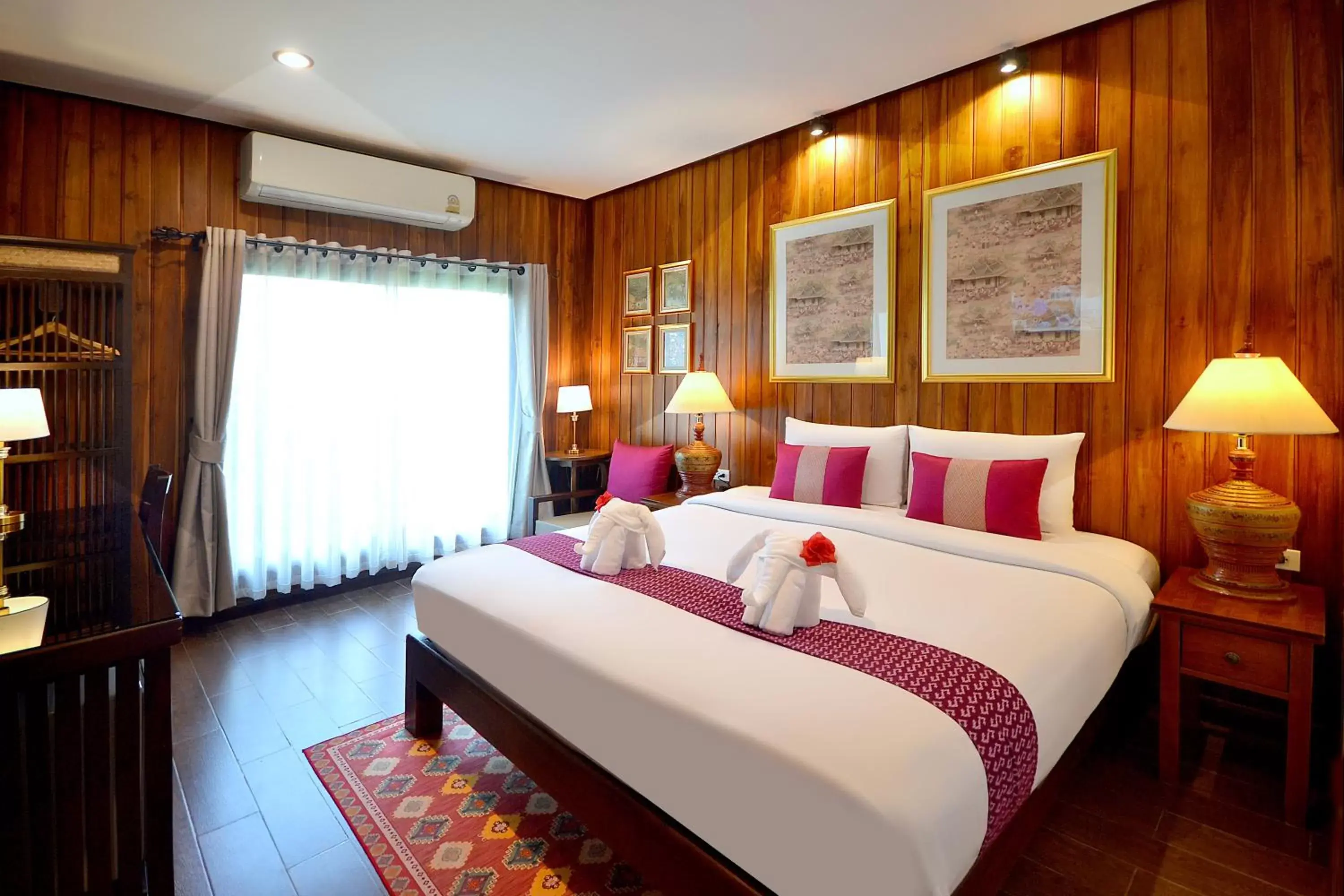 Bed in Thai Thai Sukhothai Resort