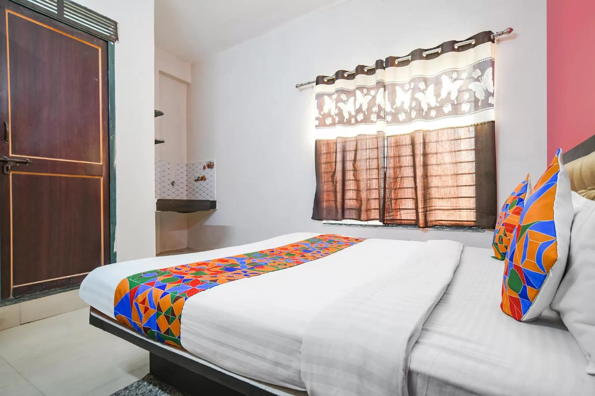 Bed in FabExpress Royal Palace Inn