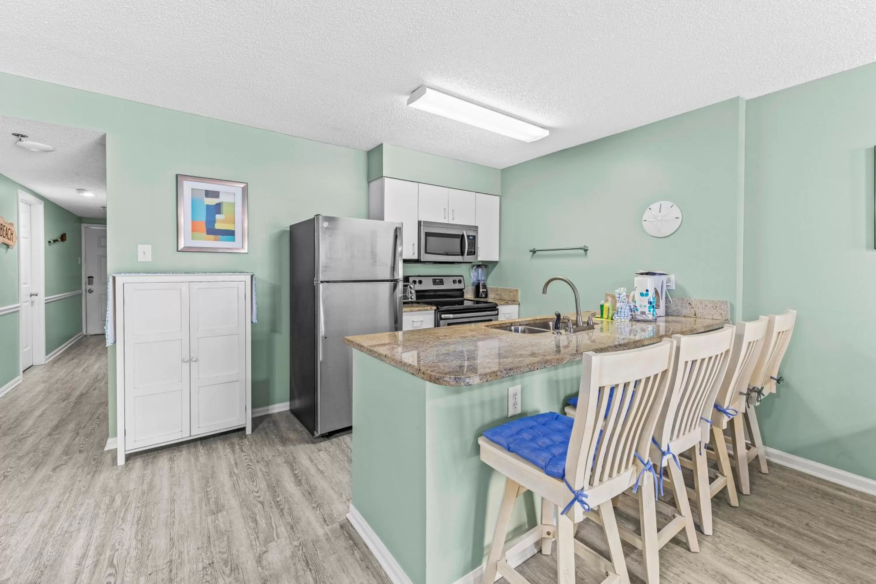 Kitchen or kitchenette in Tradewinds Unit 406