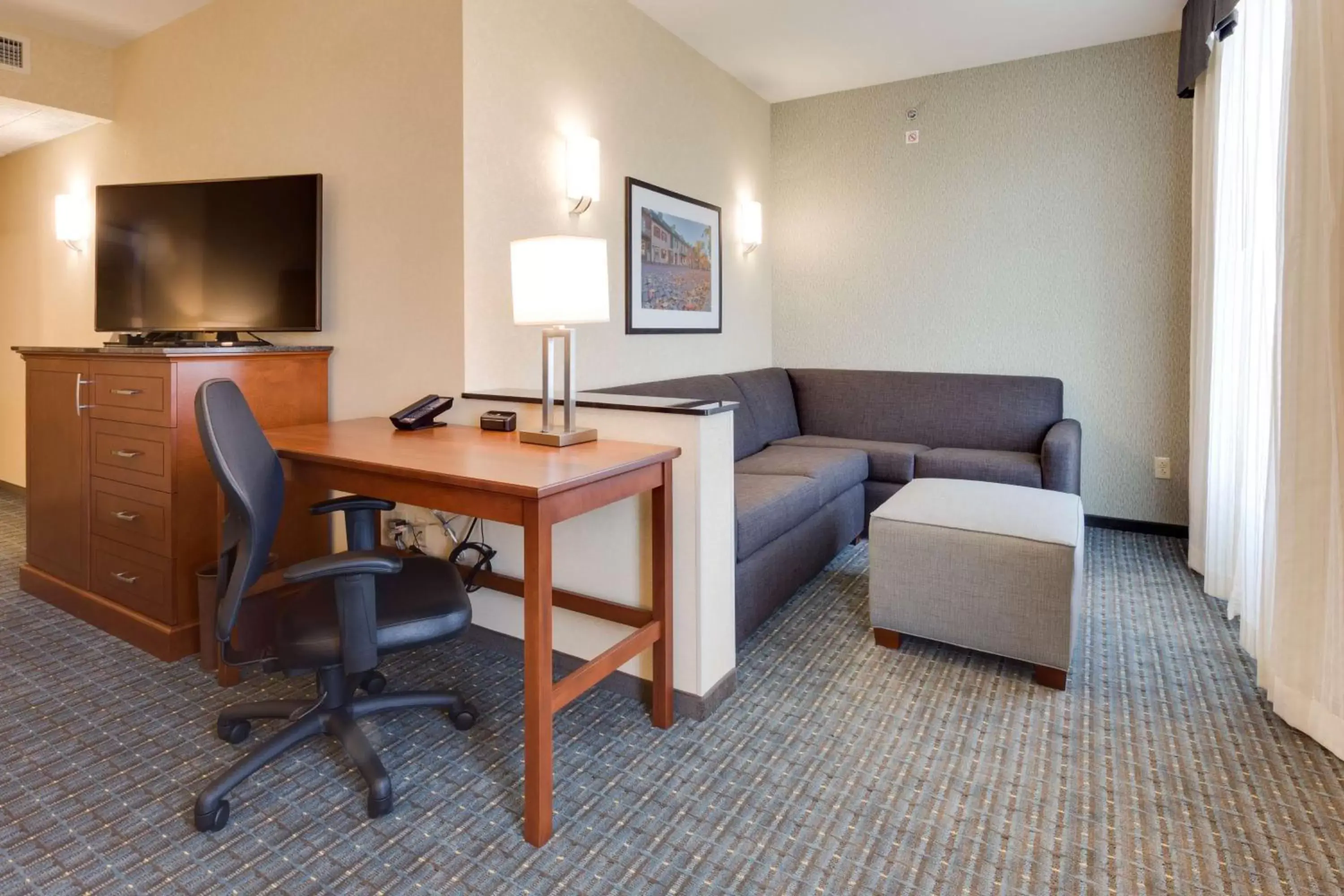 Photo of the whole room, TV/Entertainment Center in Drury Plaza Hotel St. Louis St. Charles