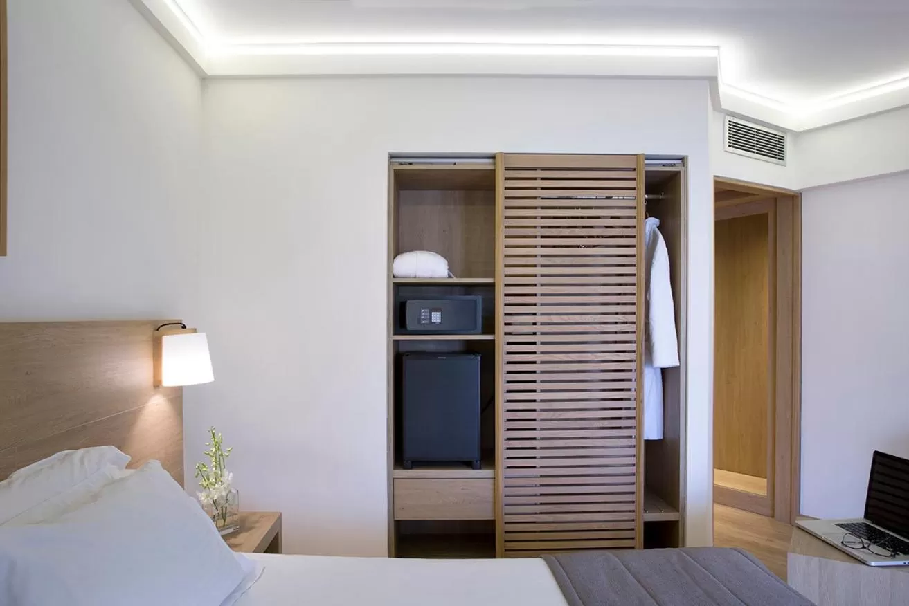 Bed in Golden Age Athens Hotel