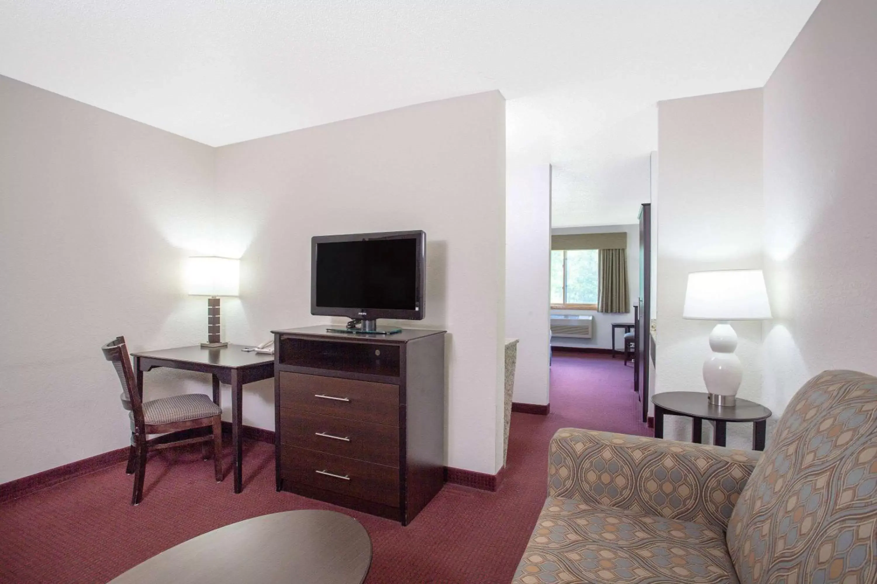 Photo of the whole room, TV/Entertainment Center in AmericInn by Wyndham Hayward