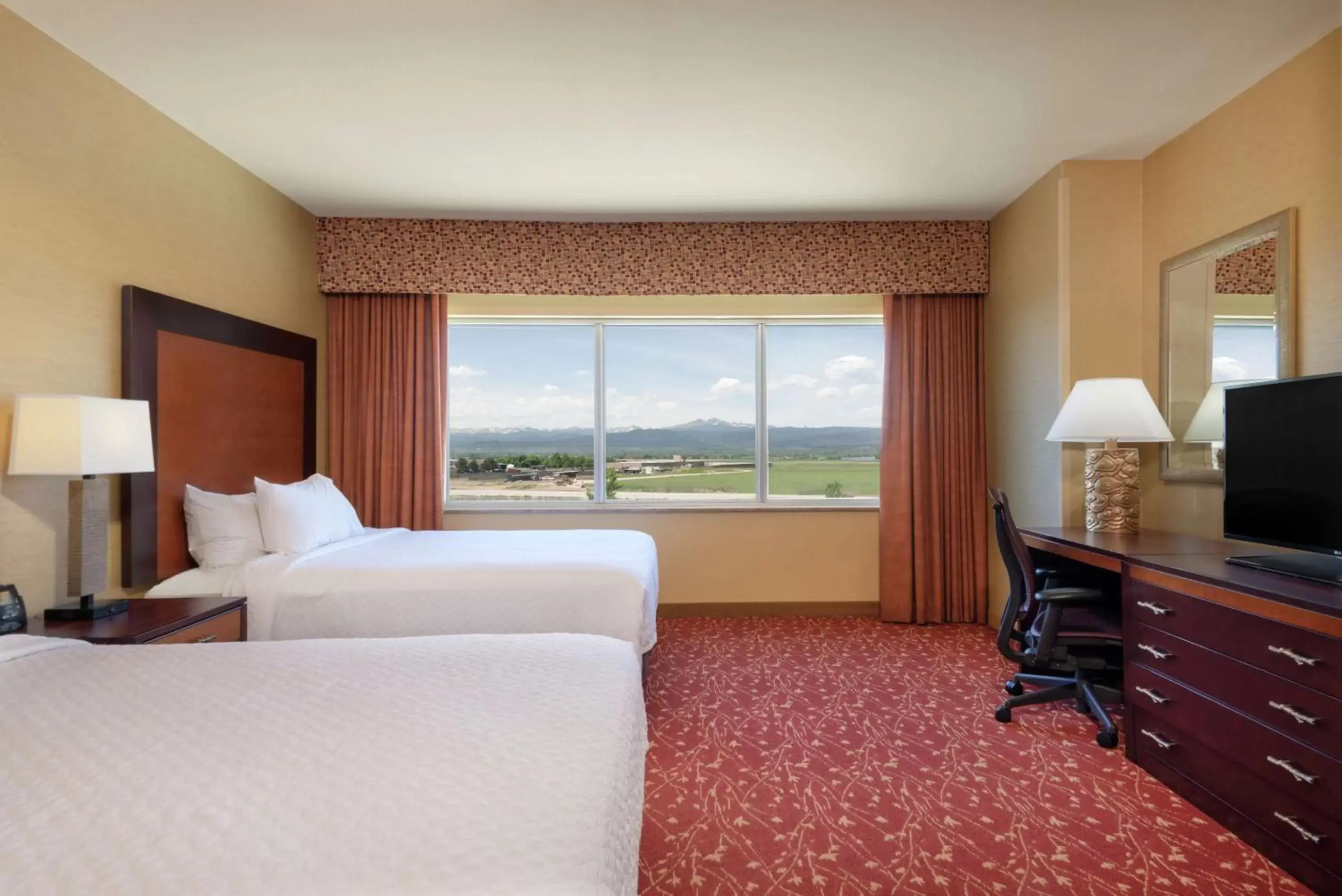 Bedroom in Embassy Suites Loveland Hotel, Spa & Conference Center