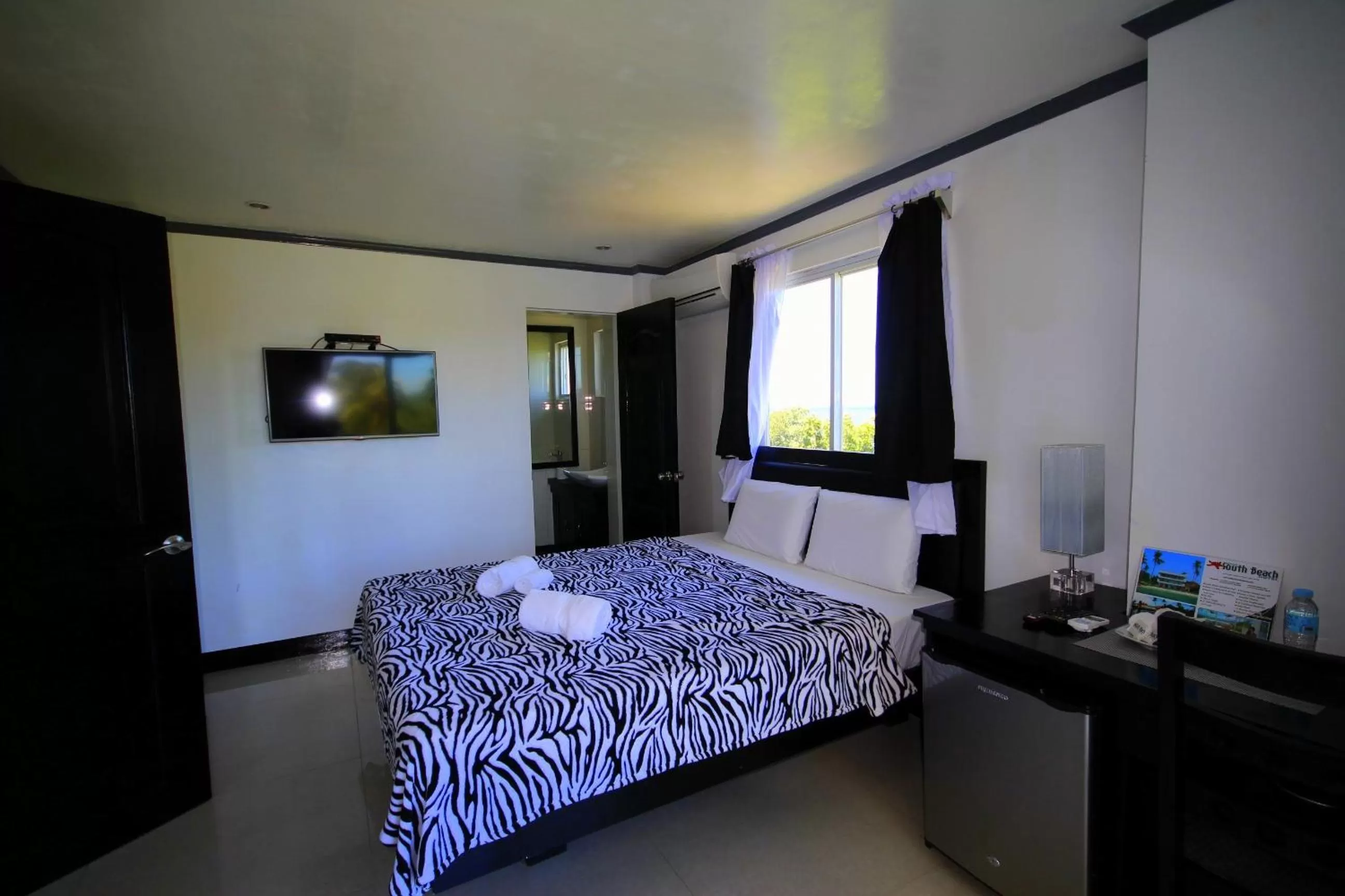 Photo of the whole room, Bed in Bohol South Beach Hotel