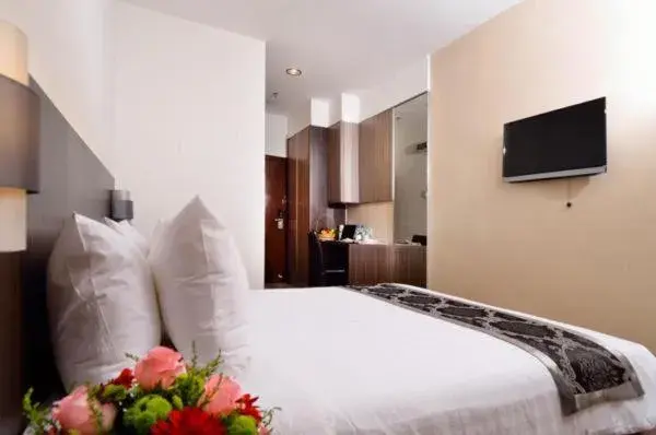 Communal lounge/ TV room, Bed in Holiday Villa Hotel & Suites Kota Bharu