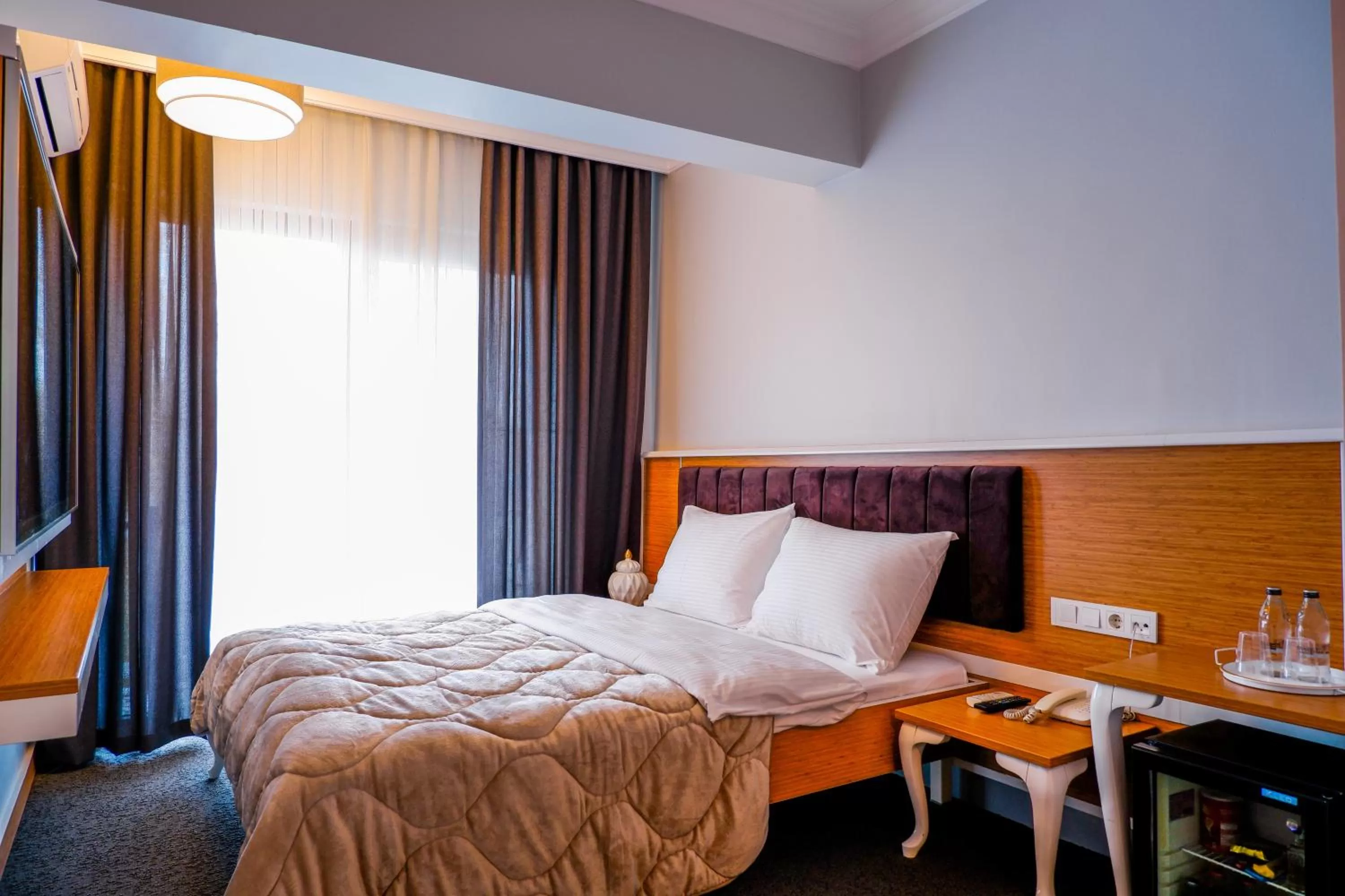 Bed in Didi Butik Hotel