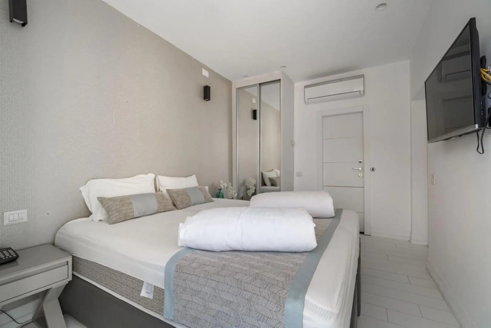 Bed in Kikar Boutique Hotel