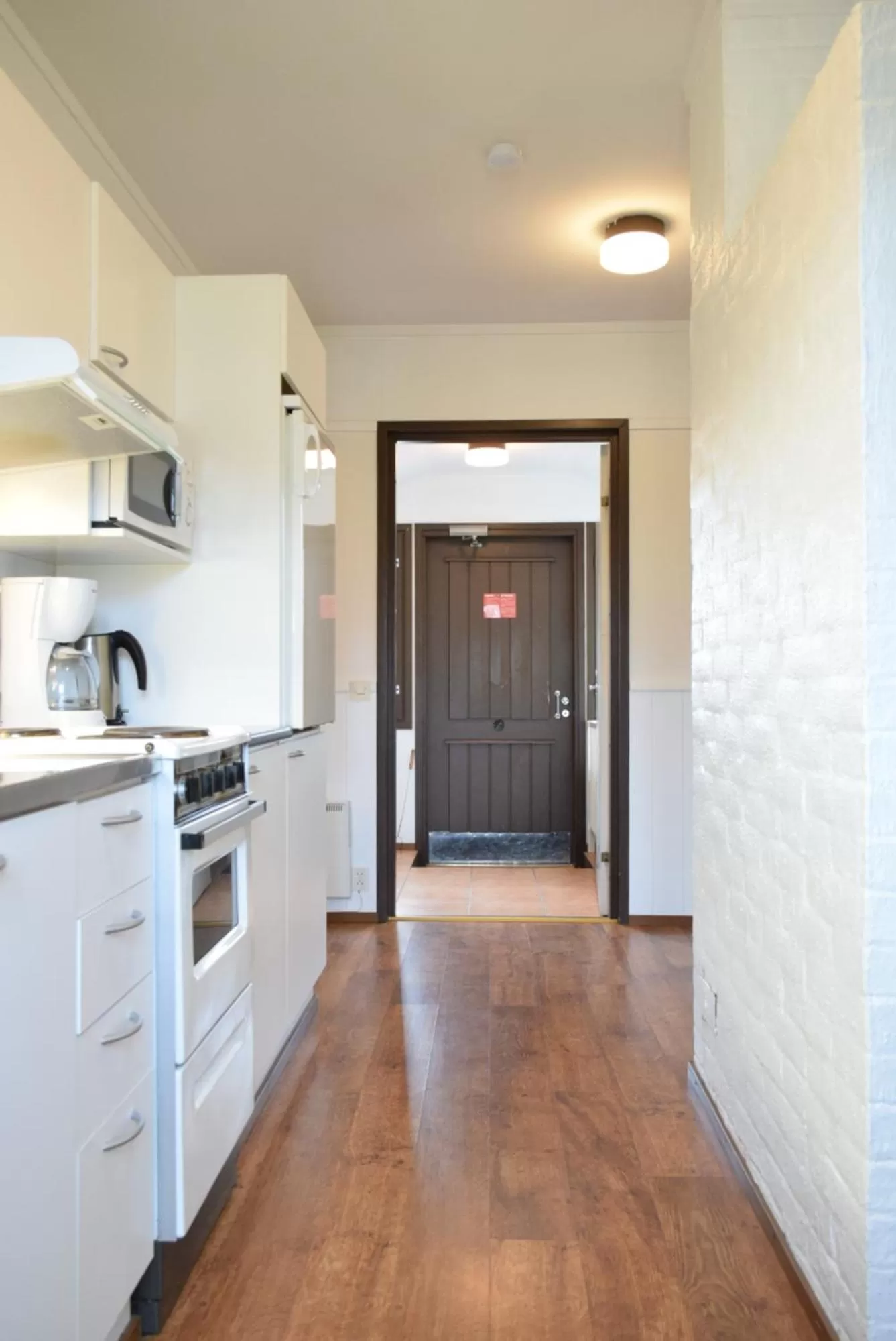 Kitchen or kitchenette in Visulahti Cottages