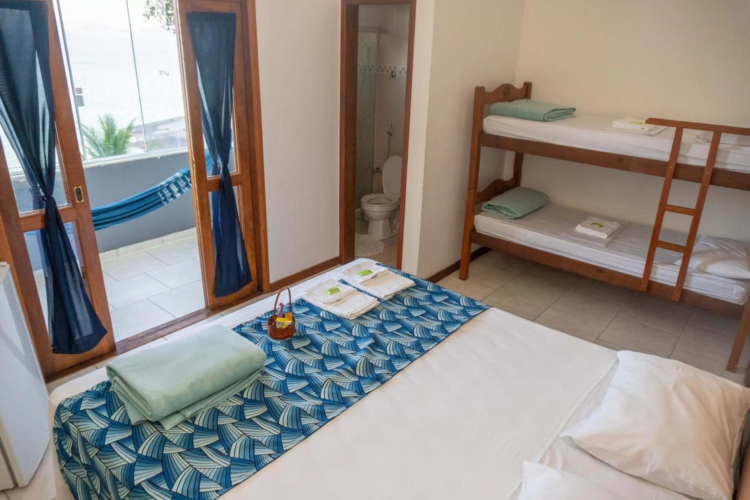 Bed in Pousada Piquara