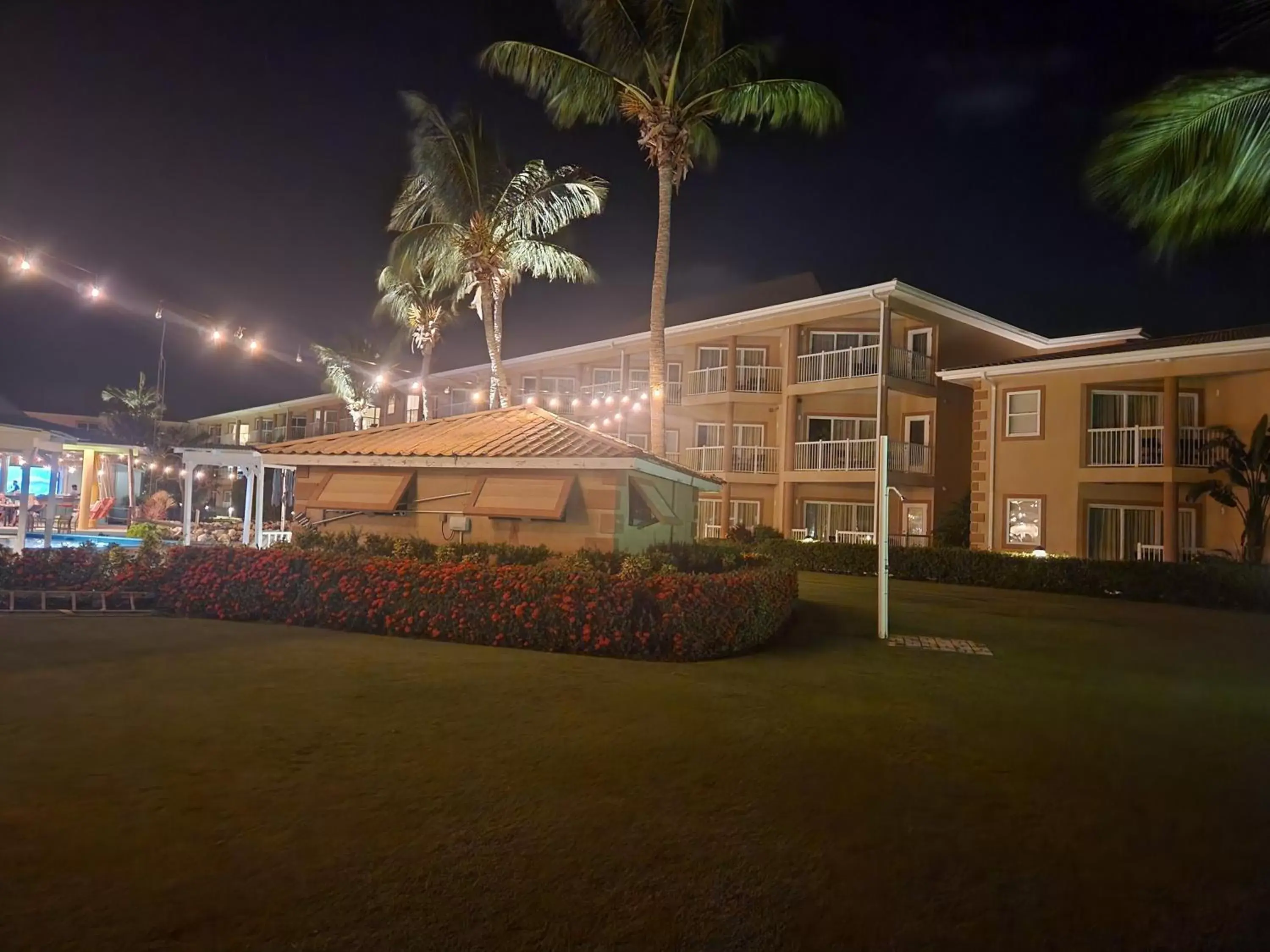 Swimming pool, Property Building in Holiday Inn Resort Grand Cayman, an IHG Hotel