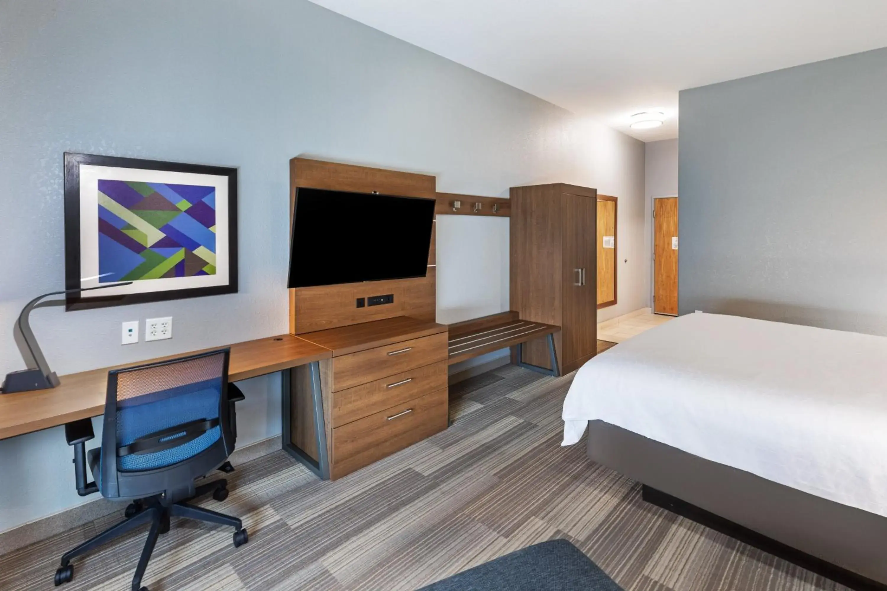 Photo of the whole room, TV/Entertainment Center in Holiday Inn Express Hotel & Suites Austin NE-Hutto, an IHG Hotel