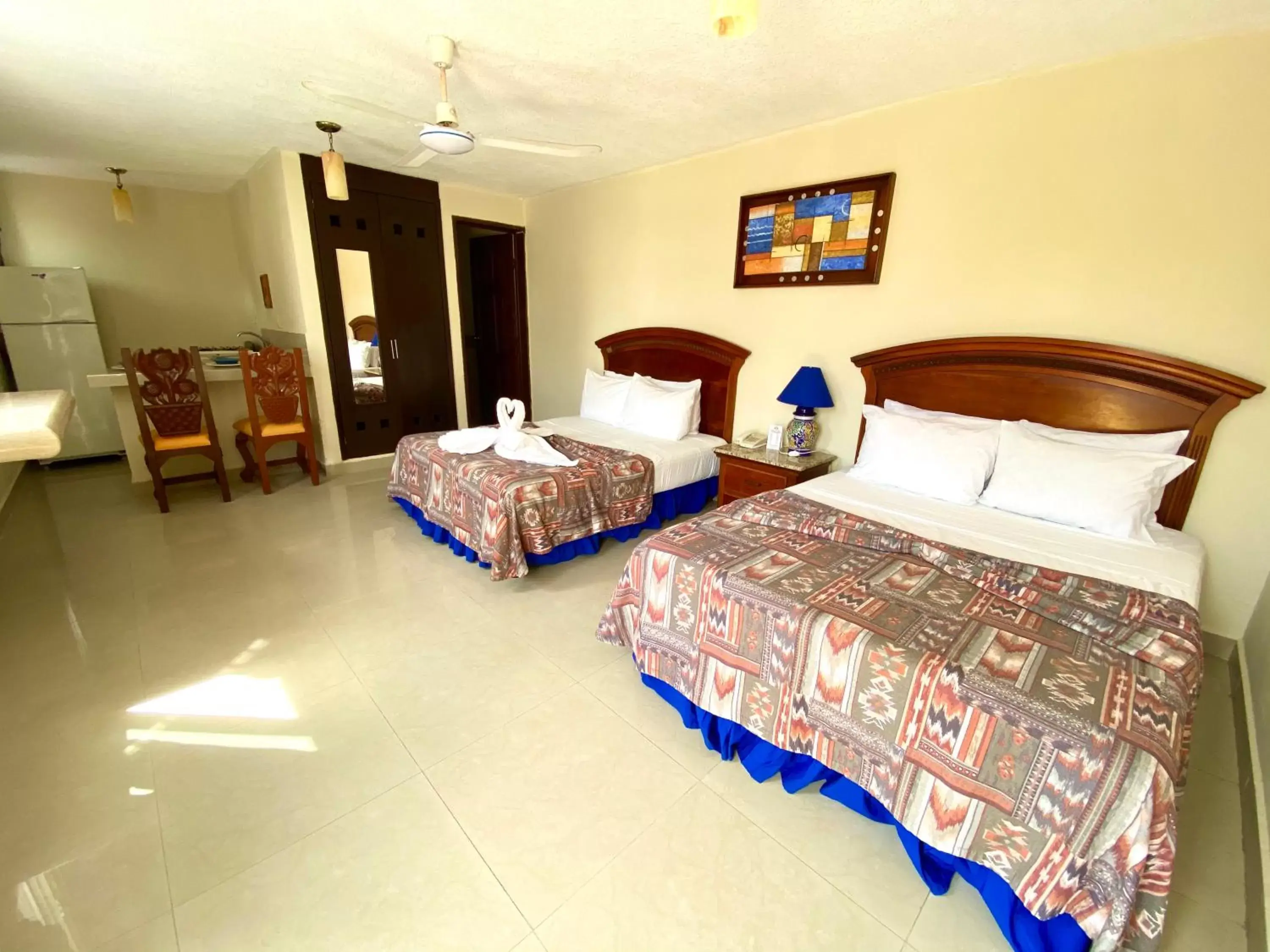 Photo of the whole room, Bed in Hotel El Campanario Playa del Carmen