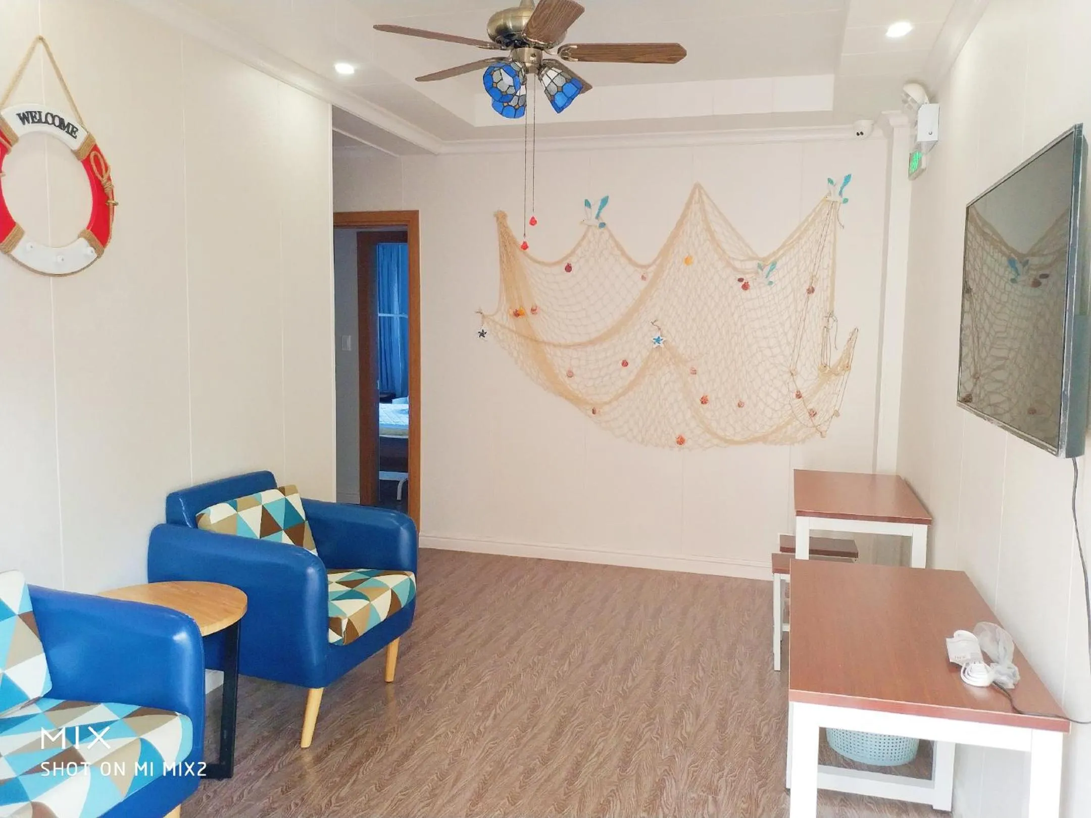 Communal lounge/ TV room in Saipan Emerald Villa