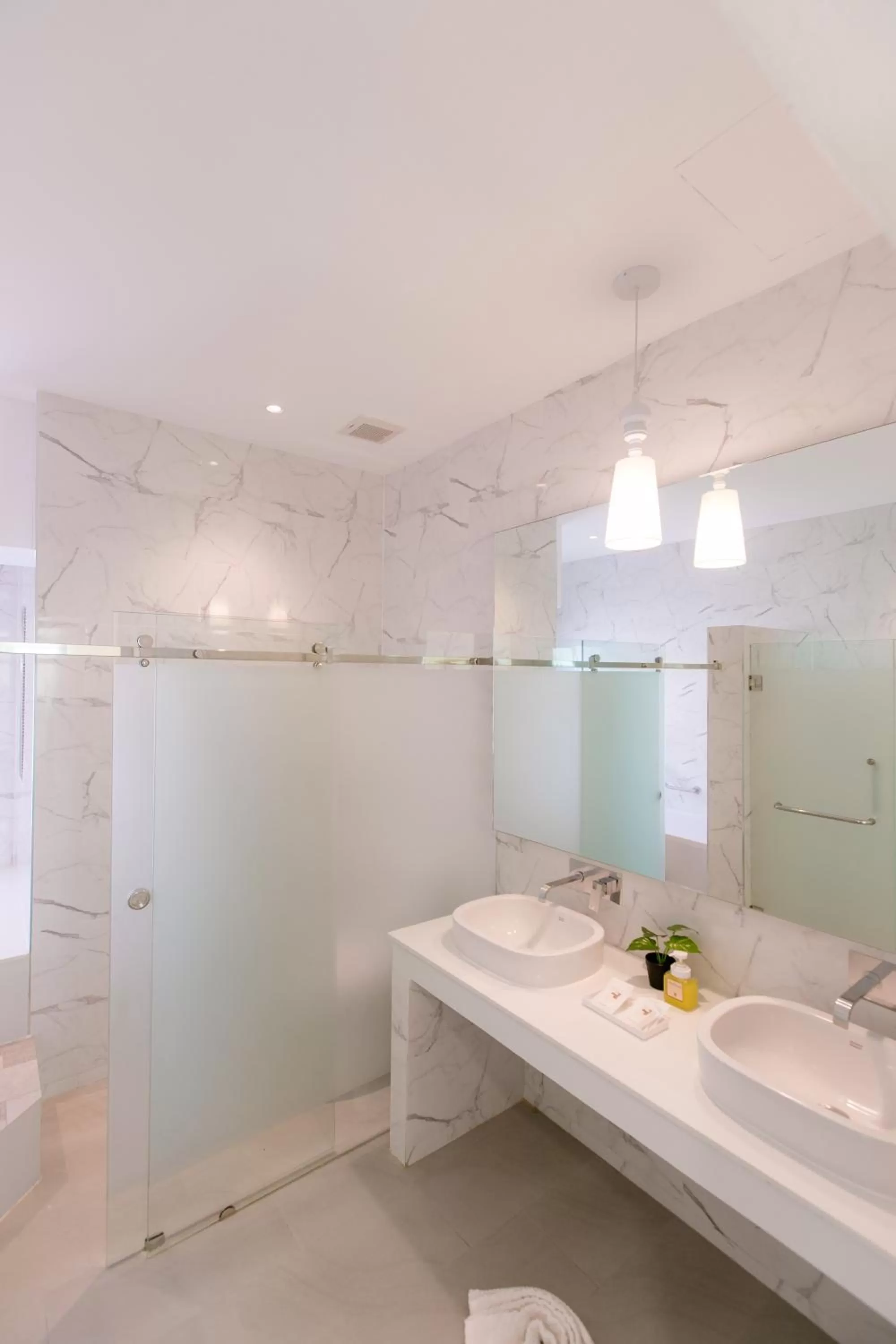 Shower in De Hug Hotel & Residence