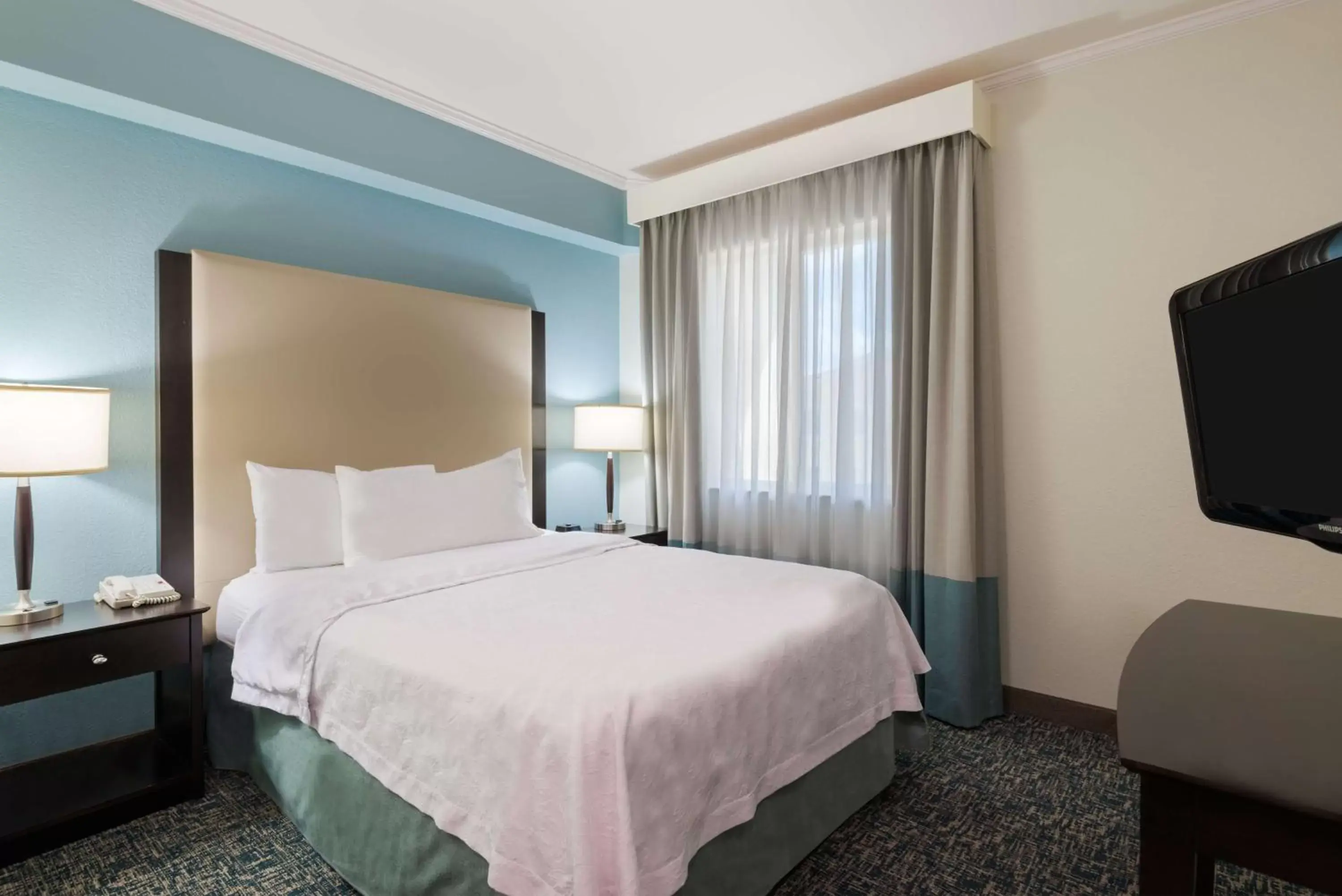 Bed in Homewood Suites by Hilton Bonita Springs