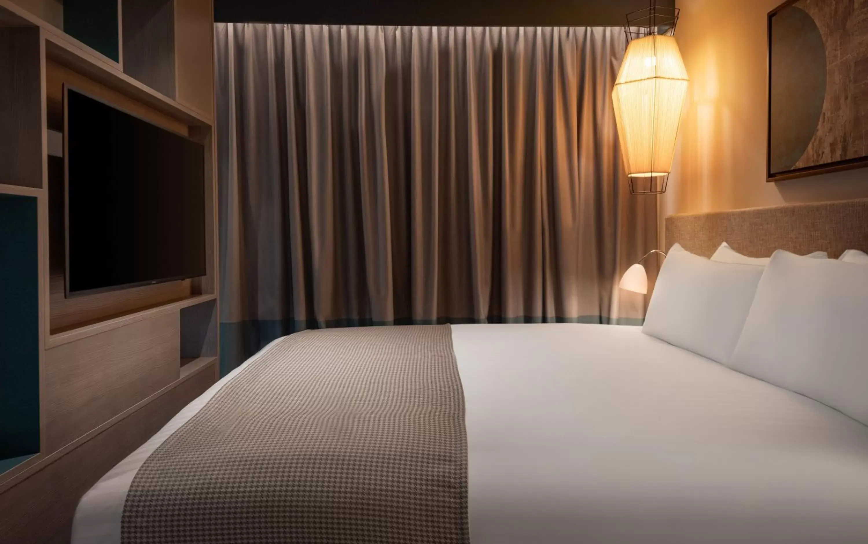 Bed in Staybridge Suites London Heathrow - Bath Road, an IHG Aparthotel