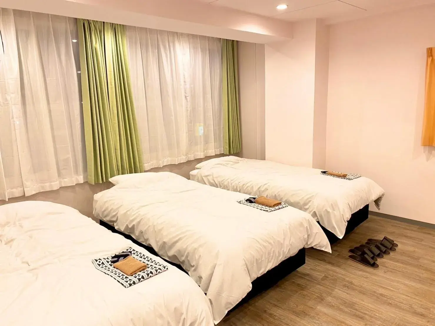 Bed in Sakura Hotel Jimbocho